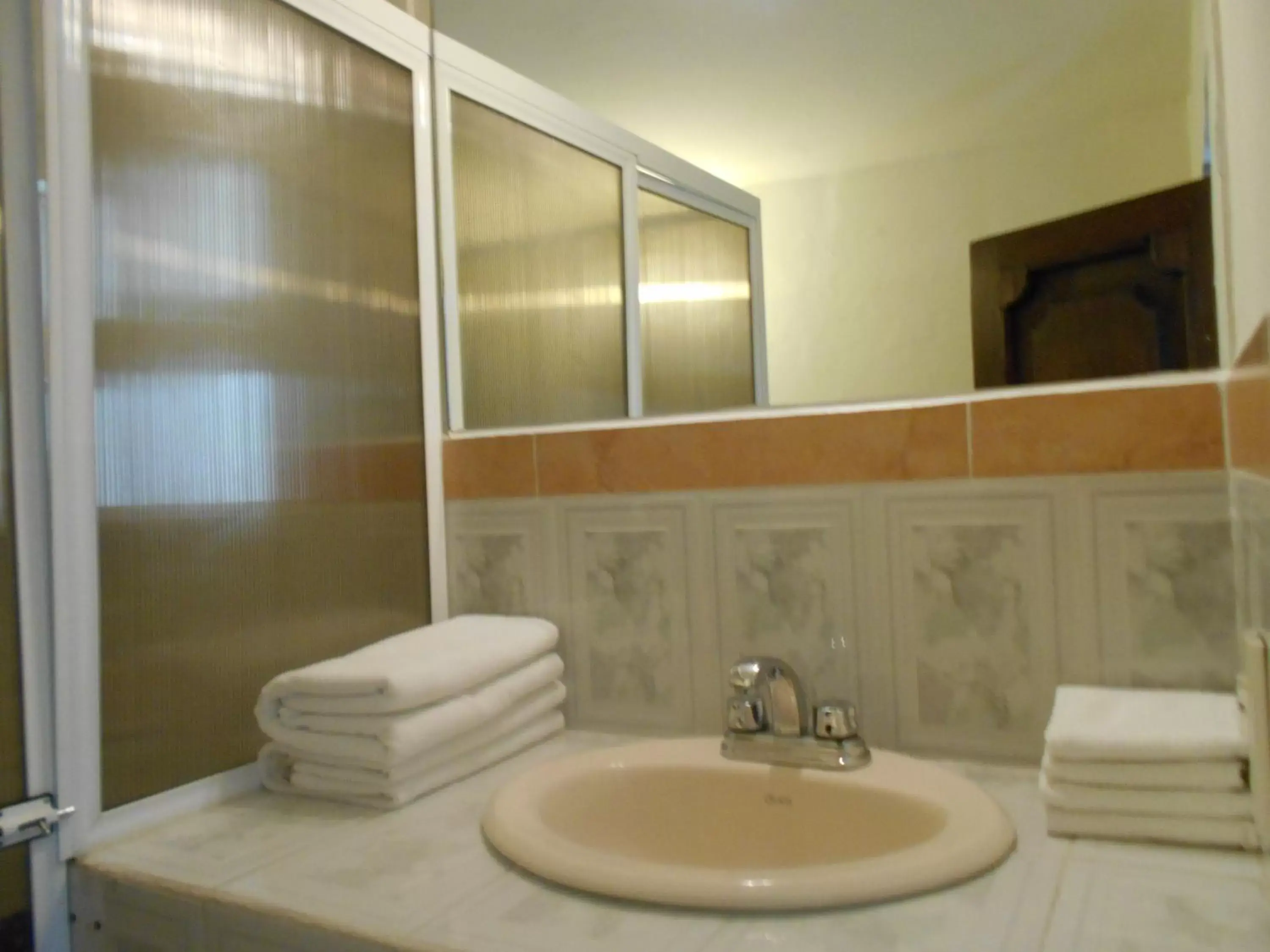 Bathroom in Hotel Expres By Hosting House