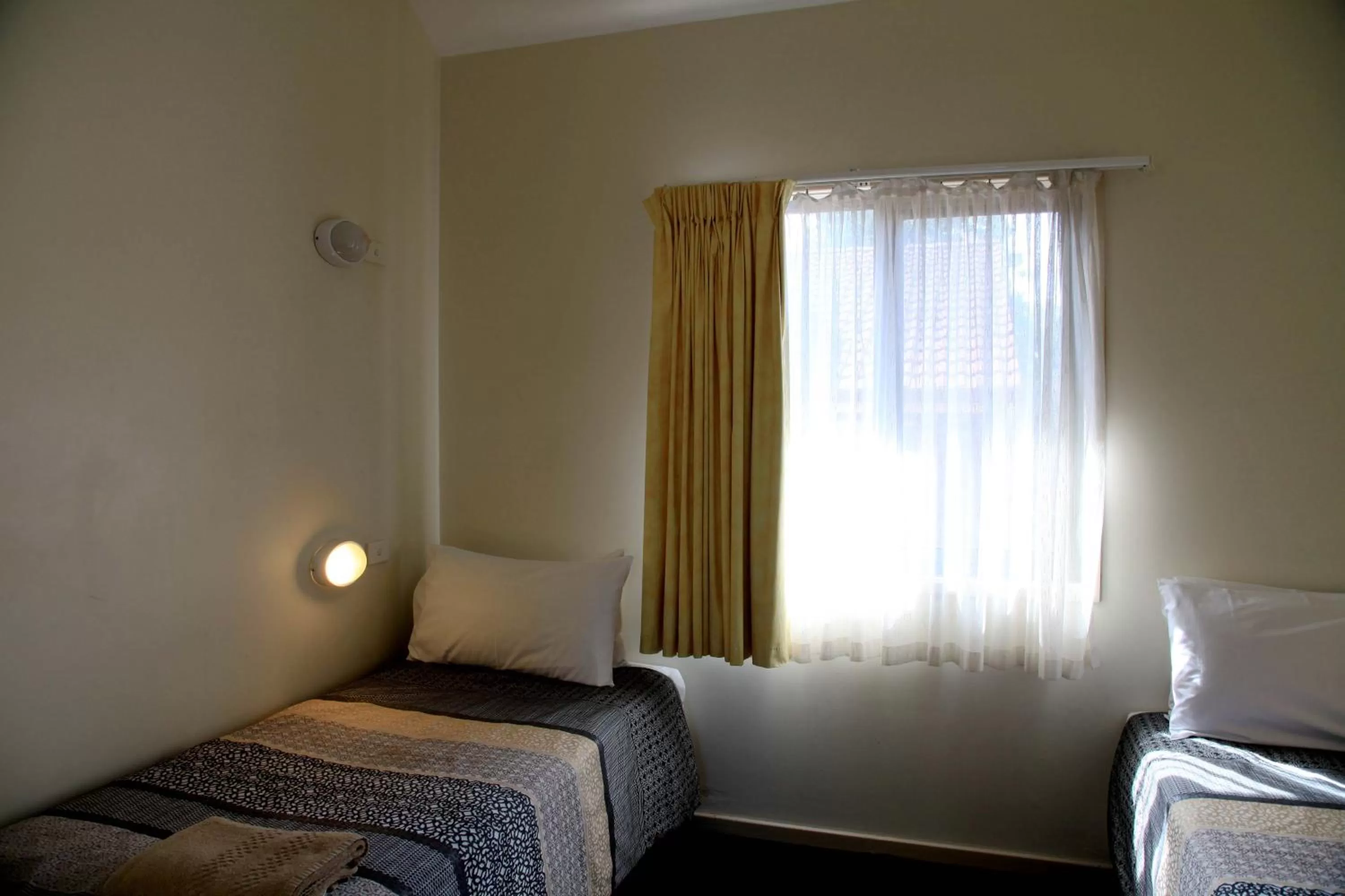 Bed in Travellers Motor Village