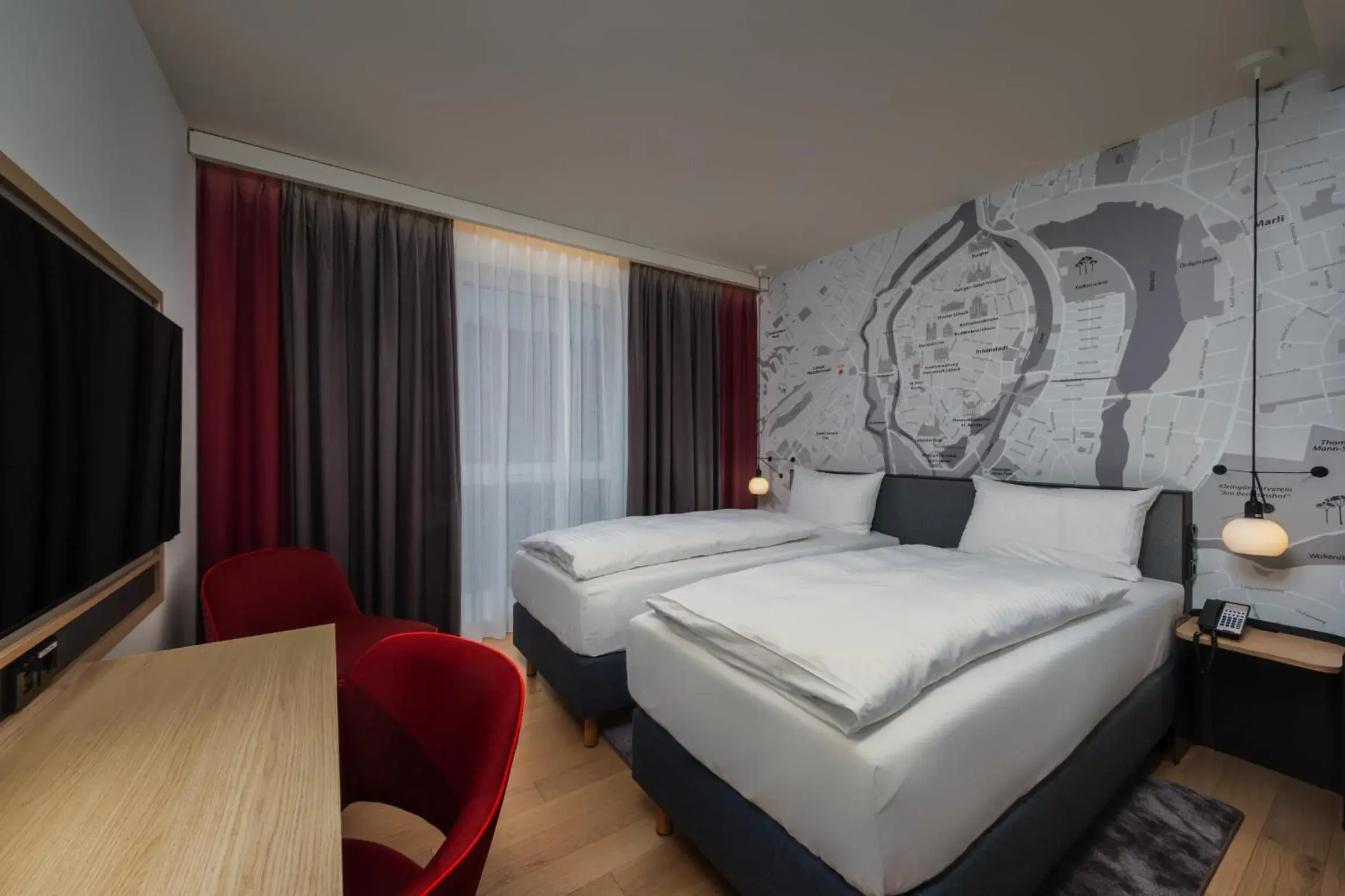 Photo of the whole room, Bed in IntercityHotel Lübeck