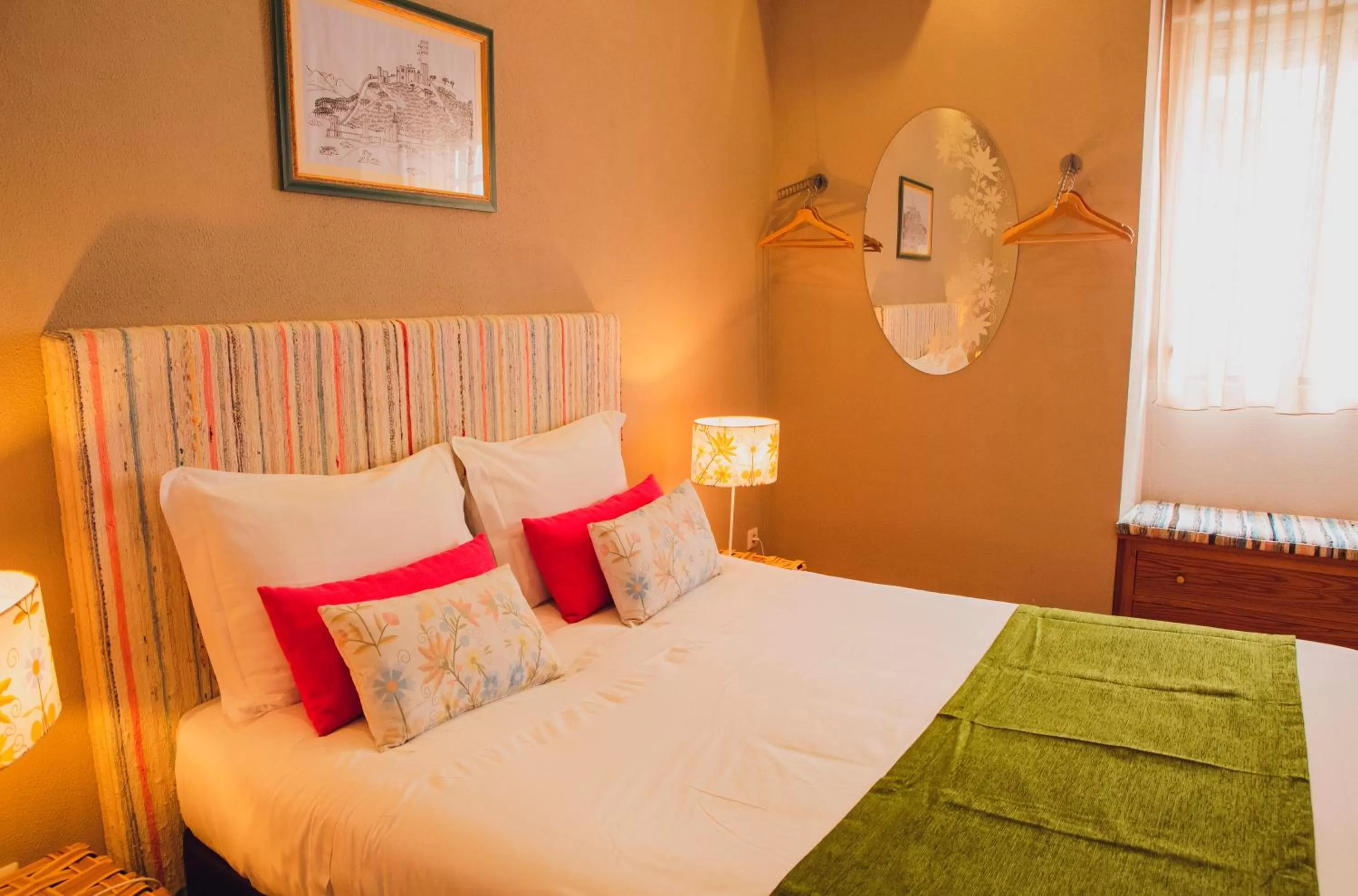 Bed in Hotel Império do Rei