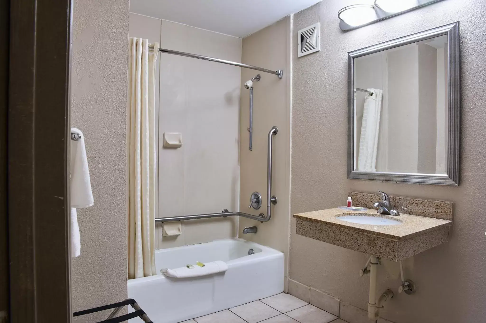 Bathroom in Super 8 by Wyndham Garysburg/Roanoke Rapids