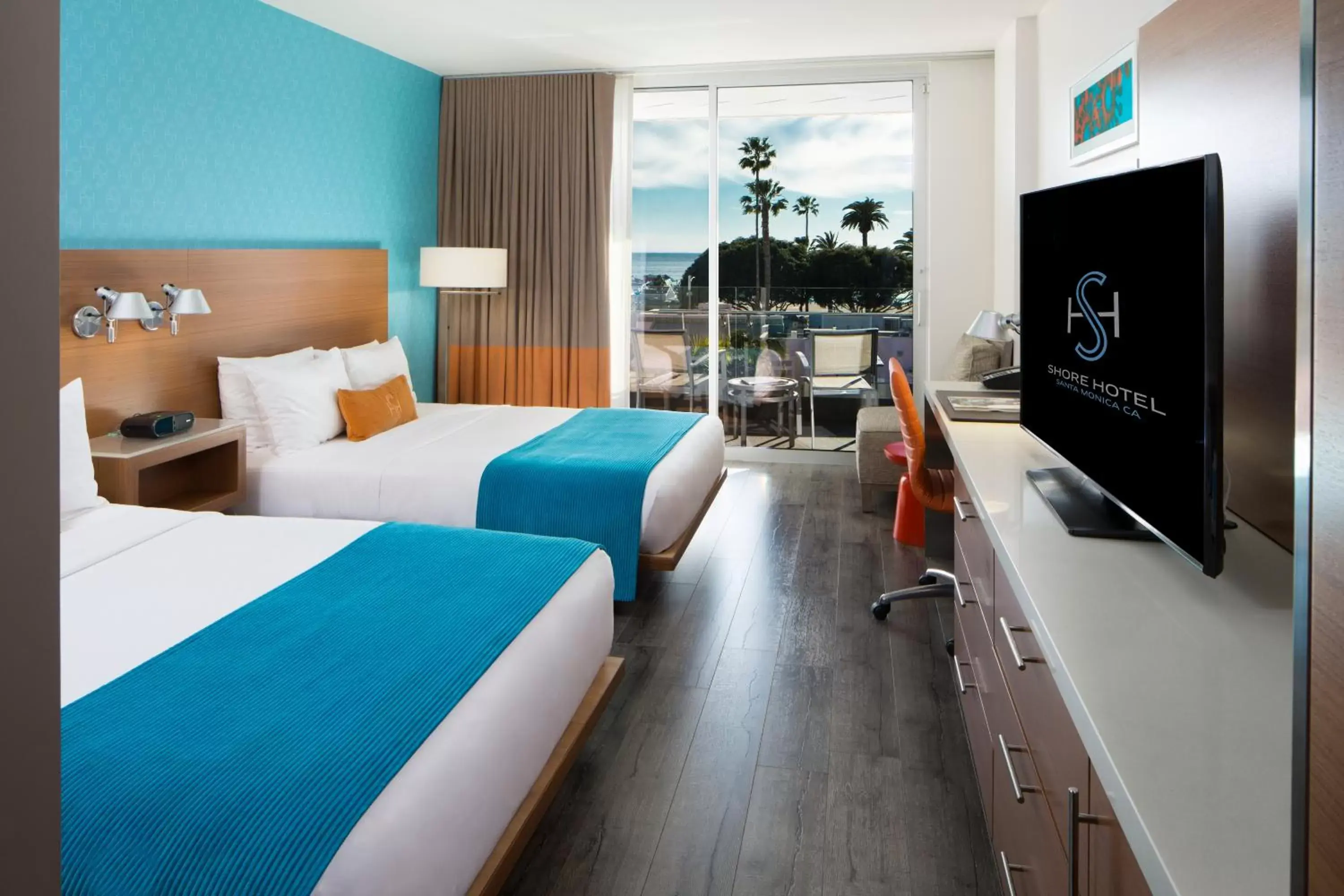 Partial Ocean View with Two Double Beds in Shore Hotel