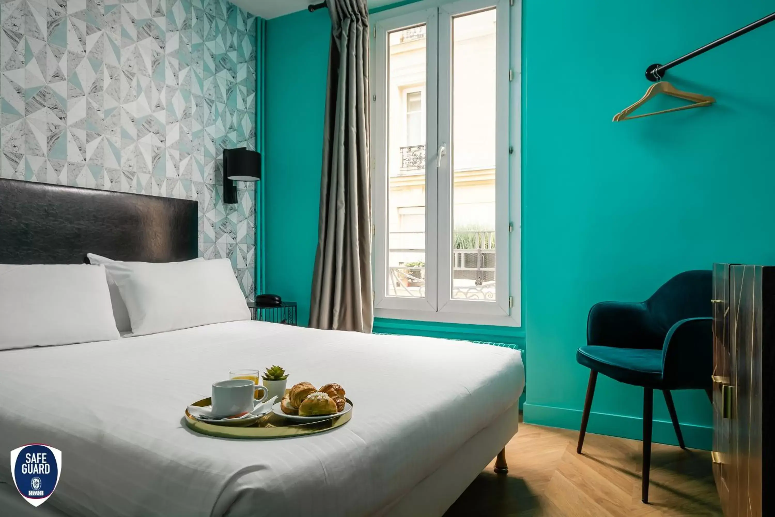 Bed in Hotel Elysée Etoile