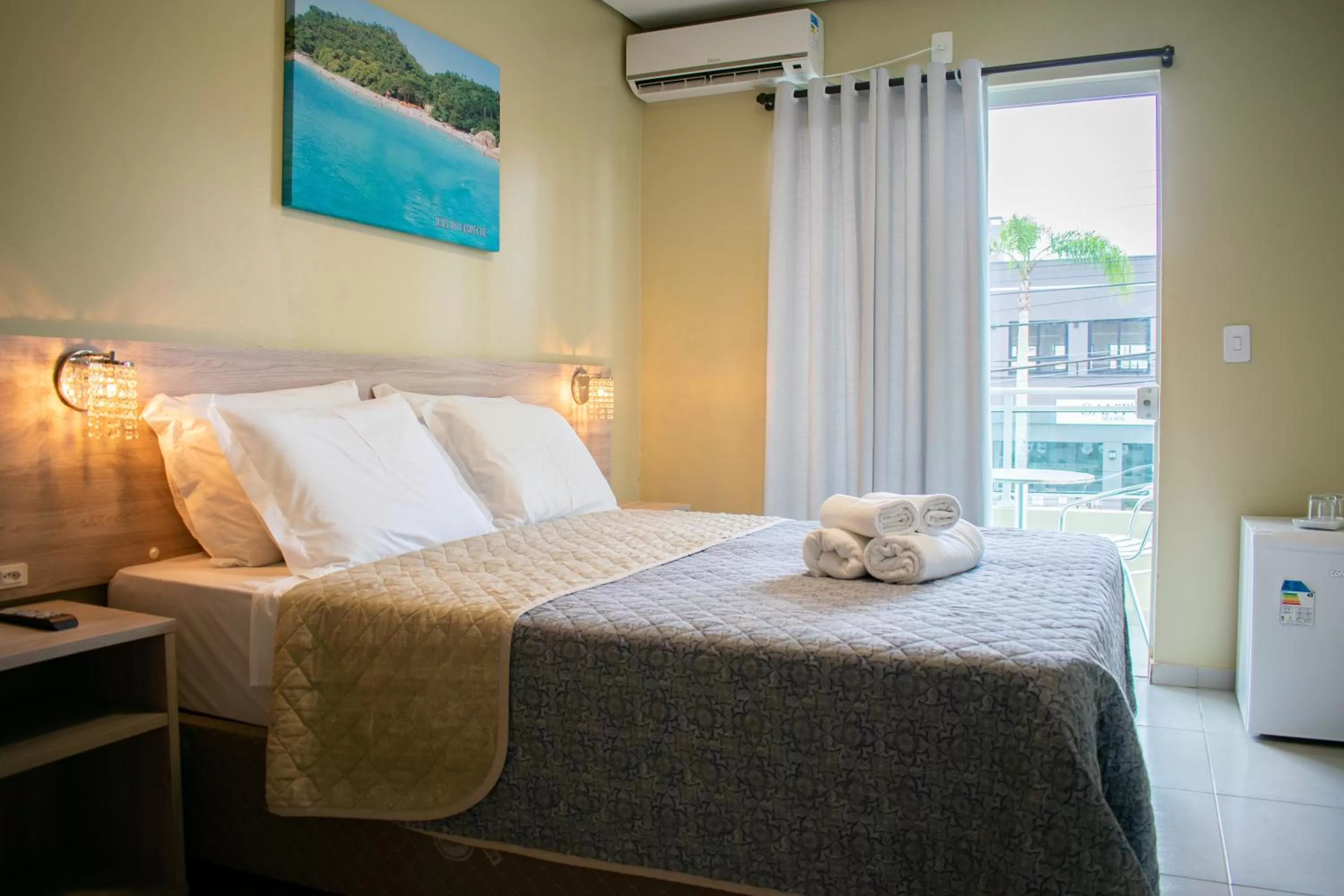 Bed in Pousada Tissiano