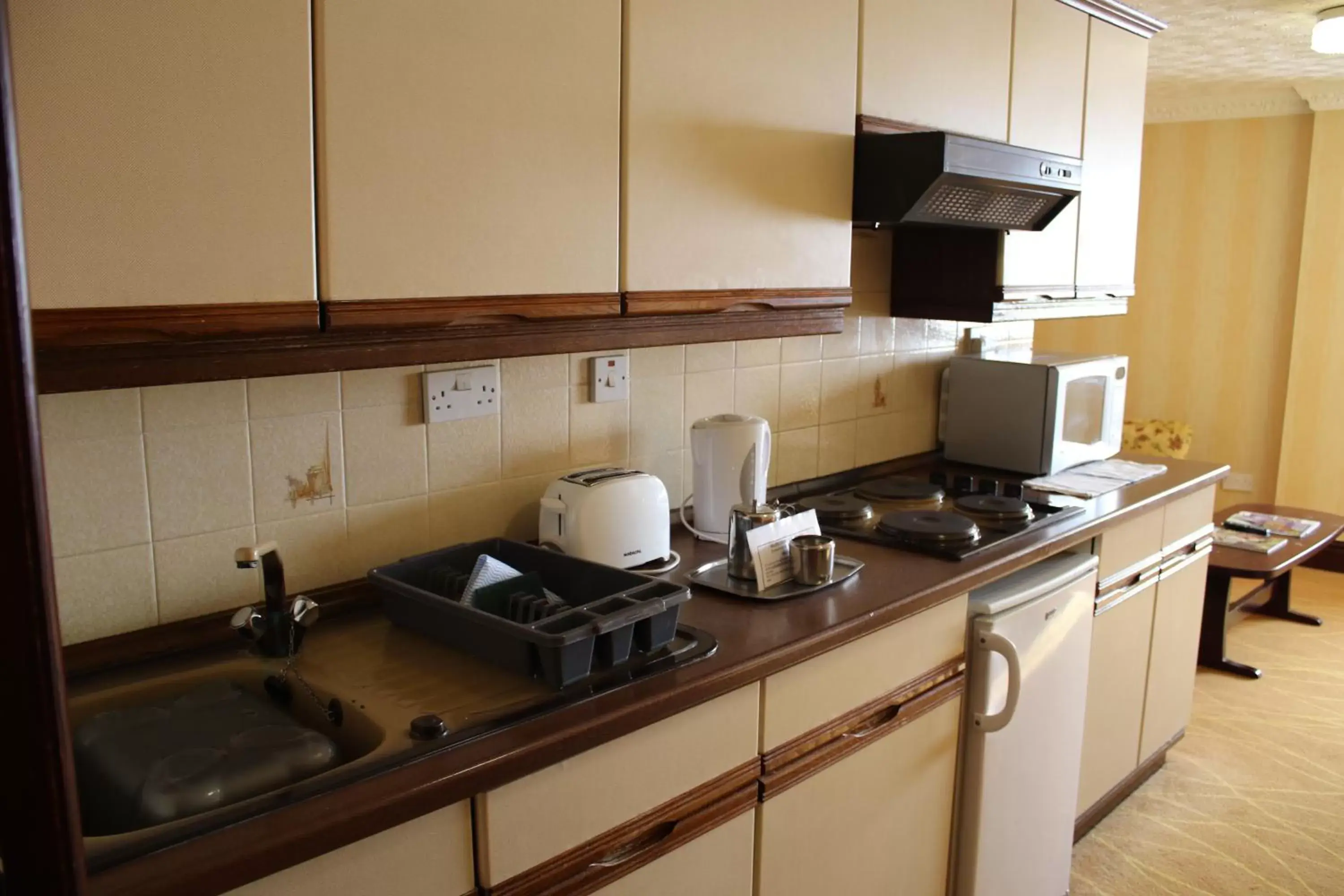 Kitchen/Kitchenette in The Devoncourt Resort