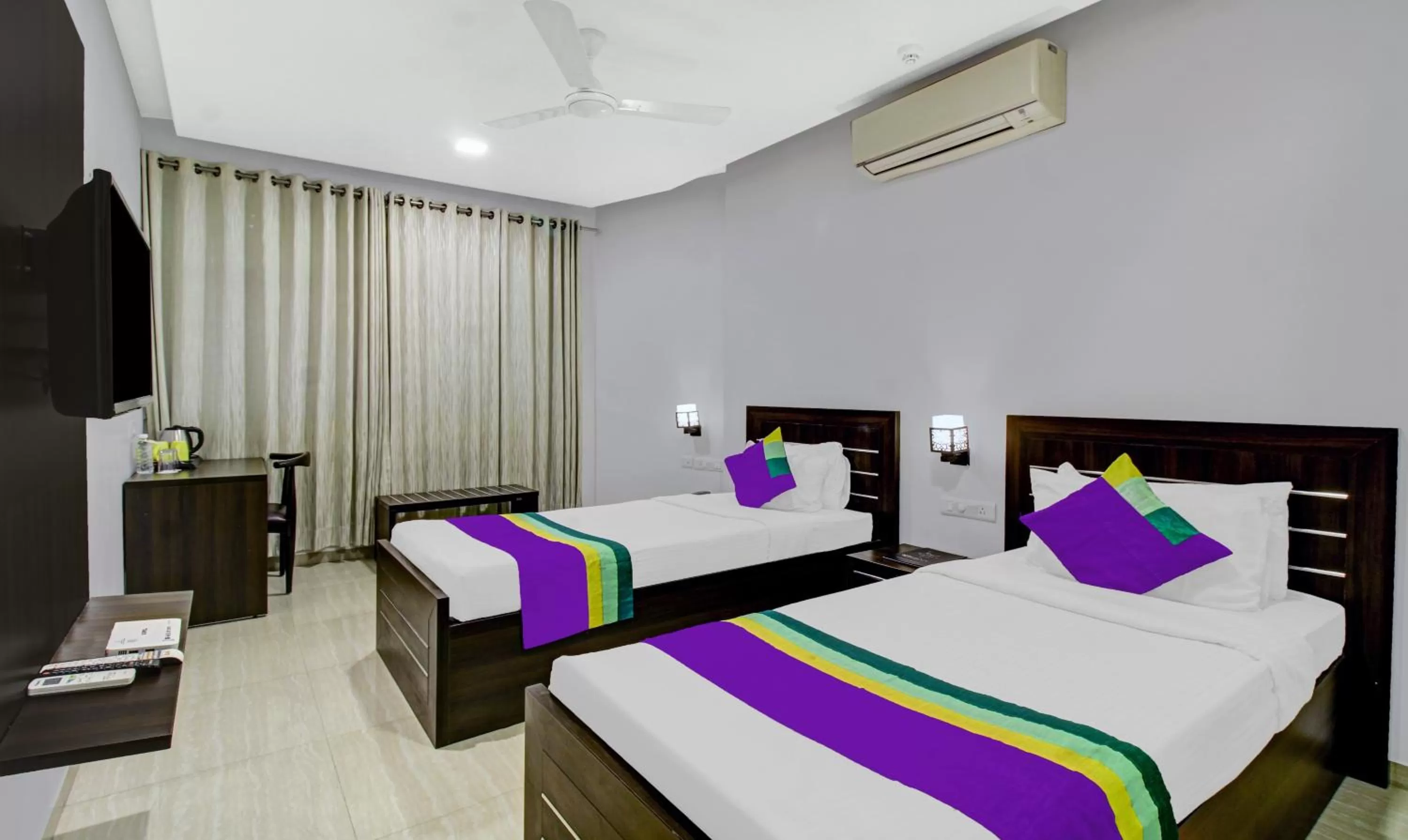 Bedroom, Bed in Treebo Premium Brijinn