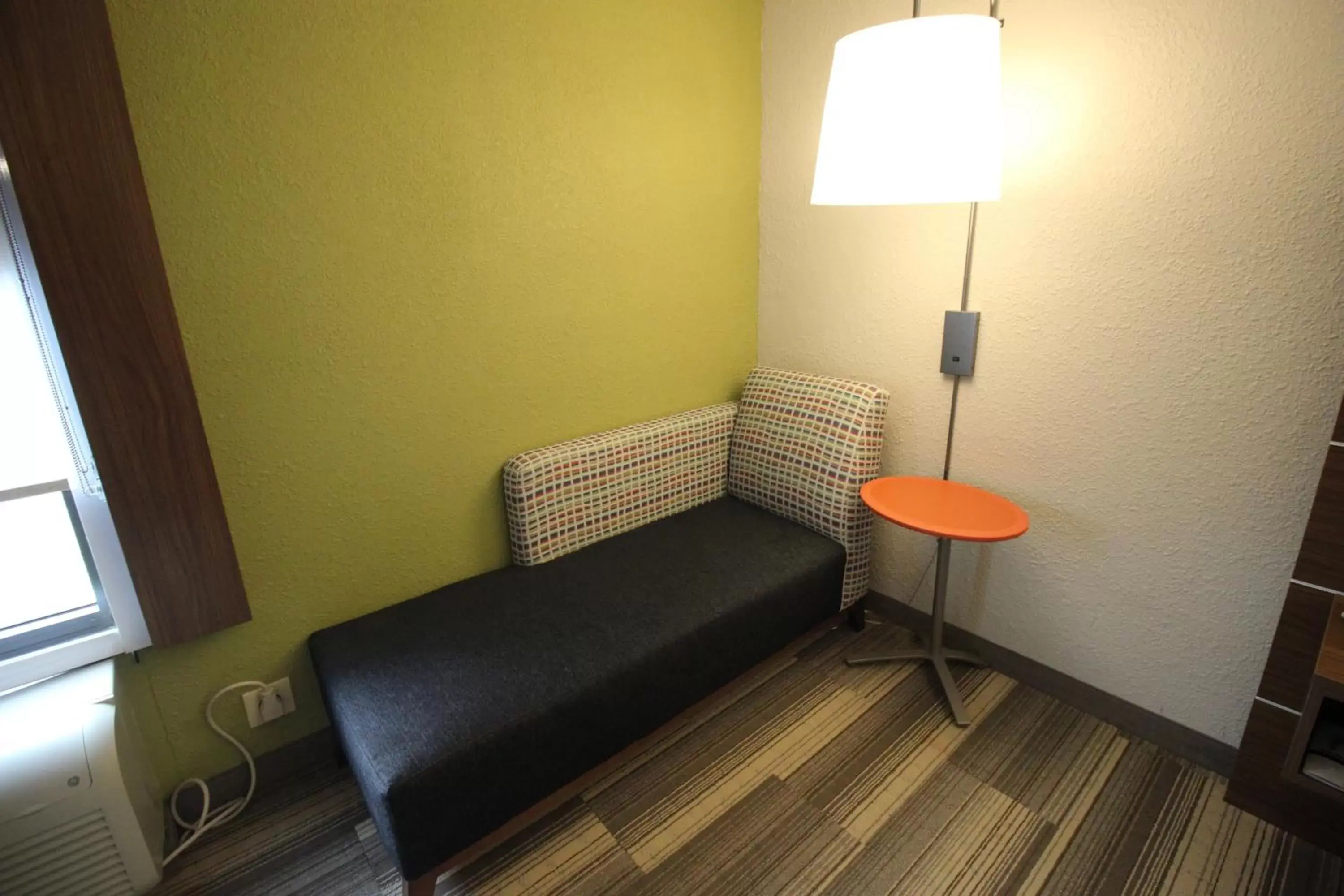 Bedroom, Seating Area in Holiday Inn Express & Suites Houston - Memorial Park Area, an IHG Hotel