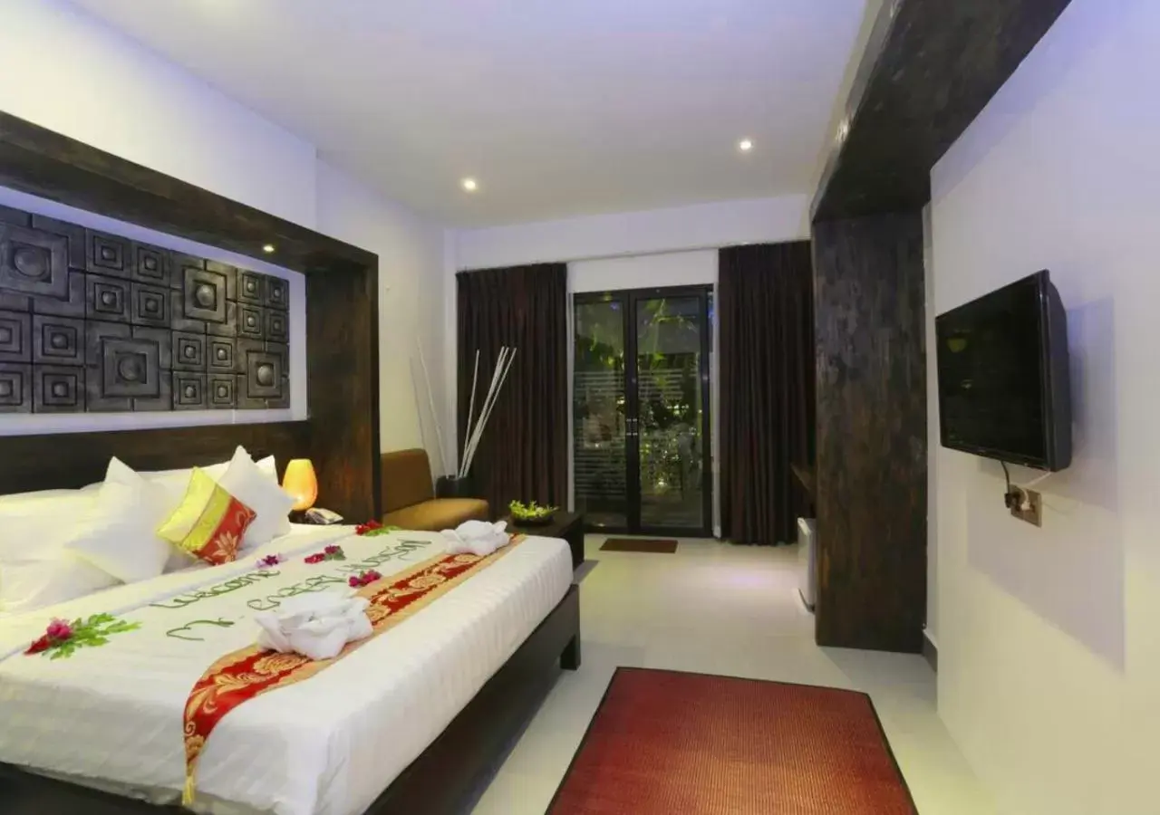 Bed in Ladear Privilege Rooms