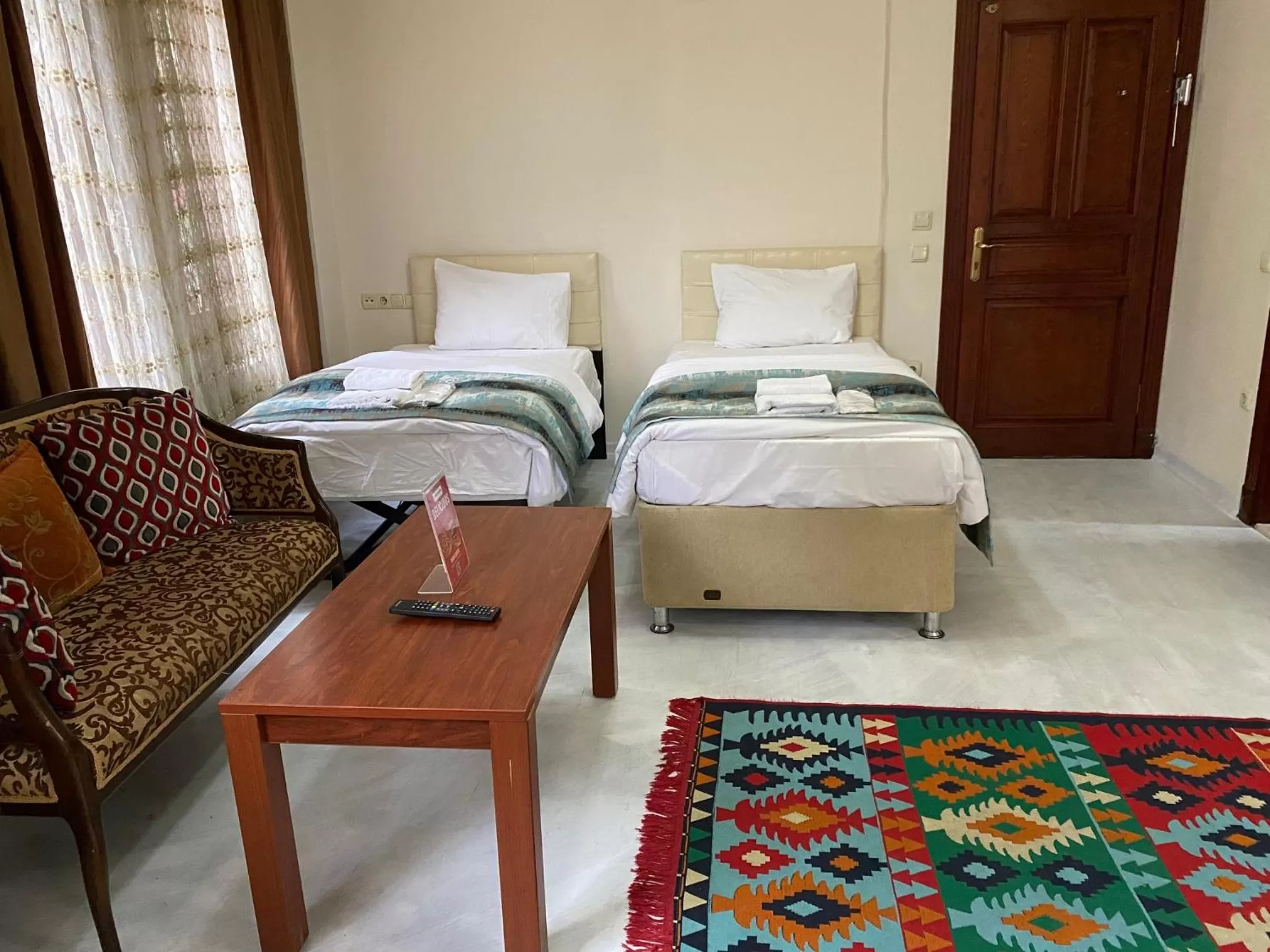 Photo of the whole room, Bed in Atam Suites