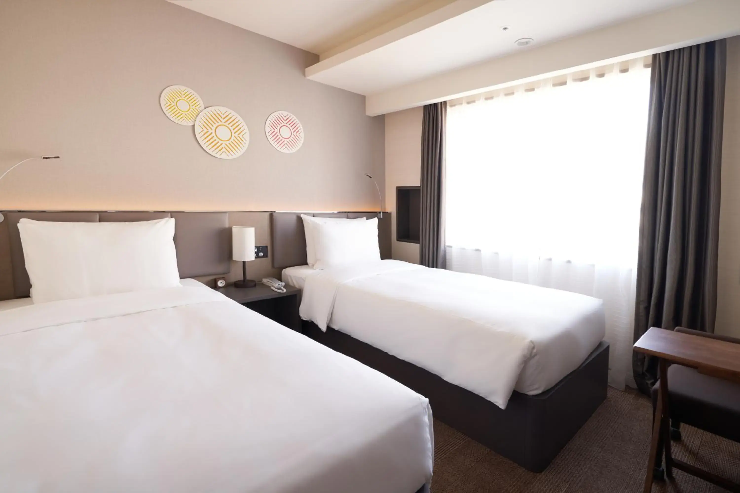 Bed in Holiday Inn & Suites Shin Osaka, an IHG Hotel