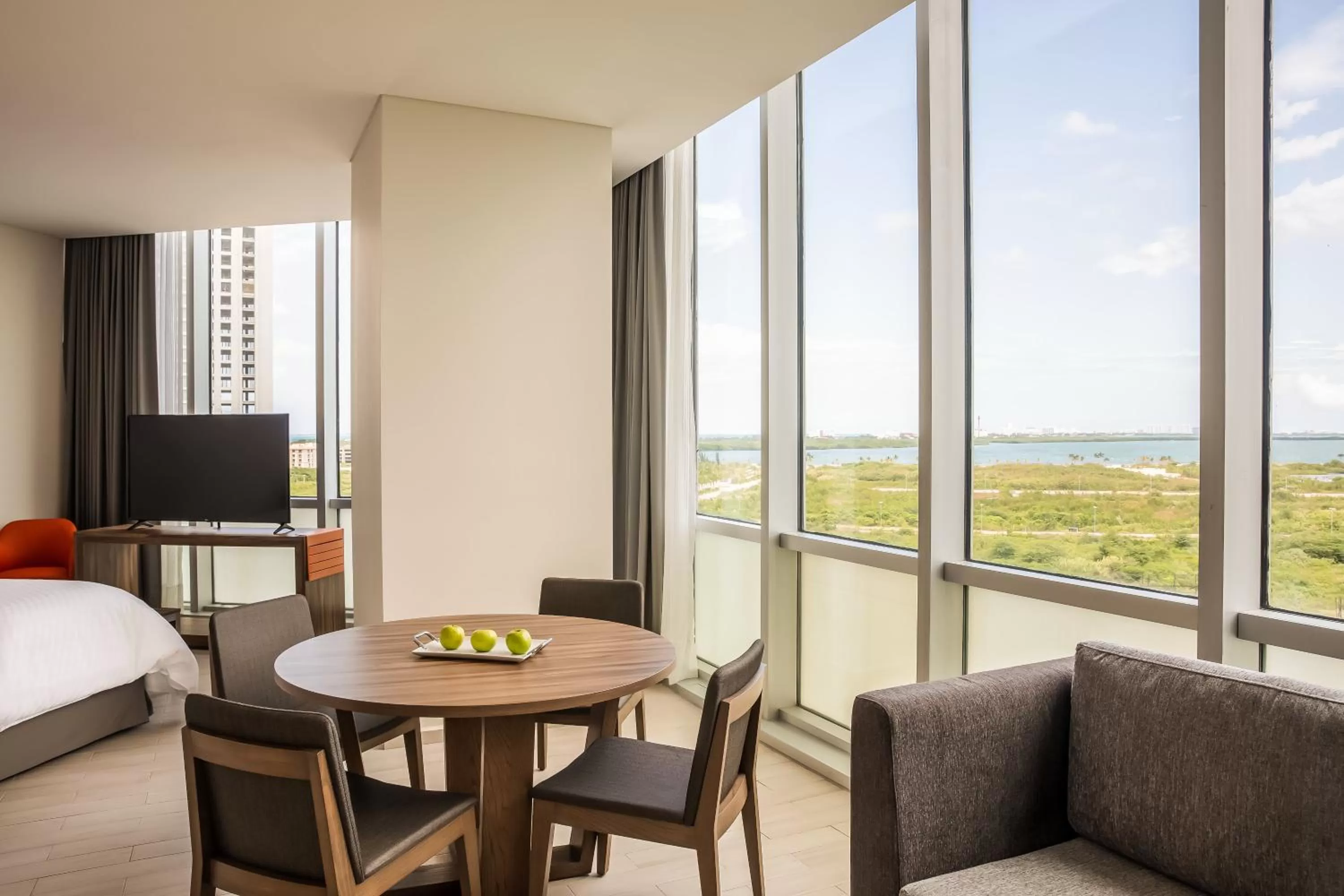 Photo of the whole room, Bed in Fiesta Inn Cancun Las Americas