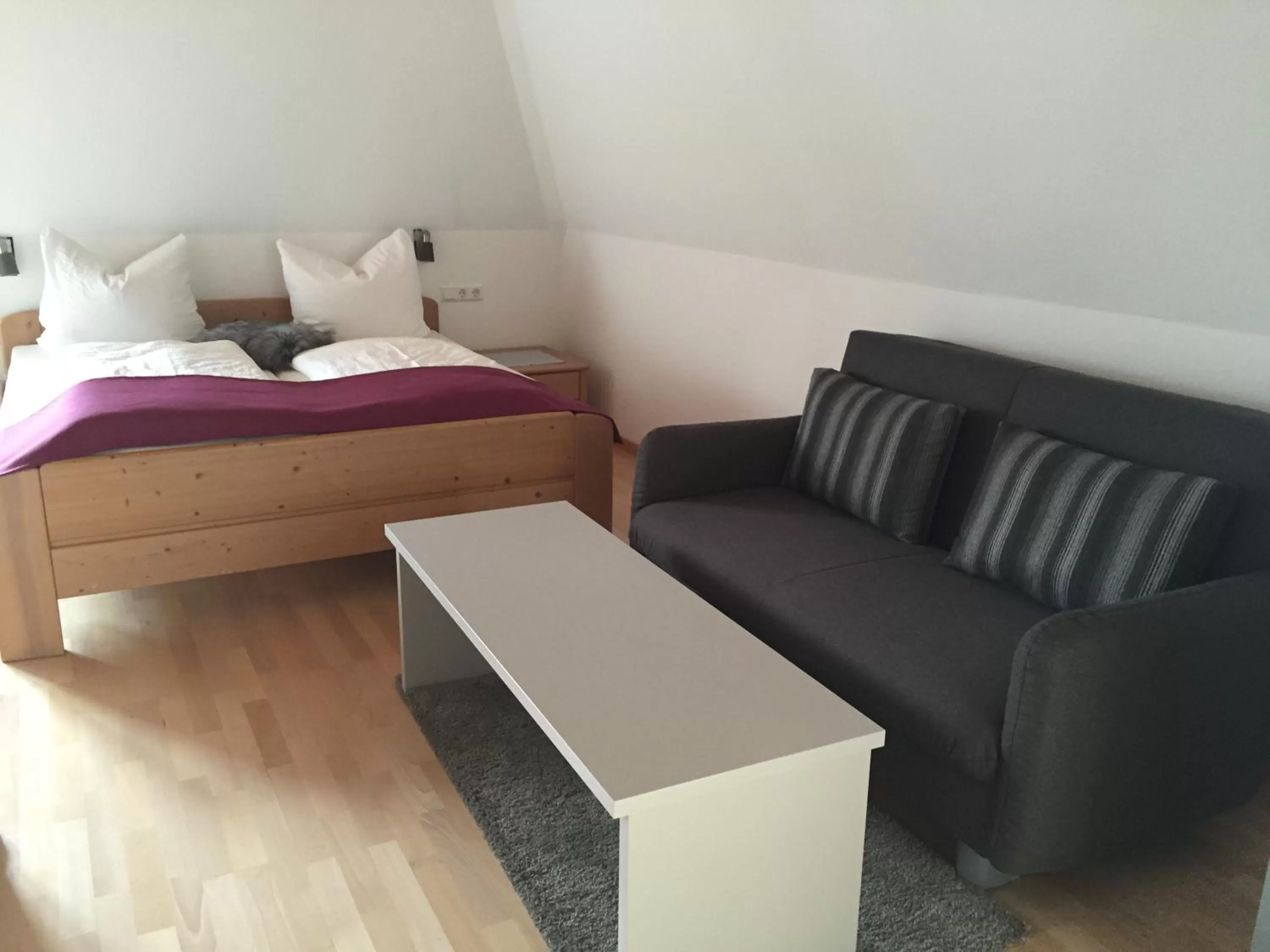 Seating area, Bed in Torstuben