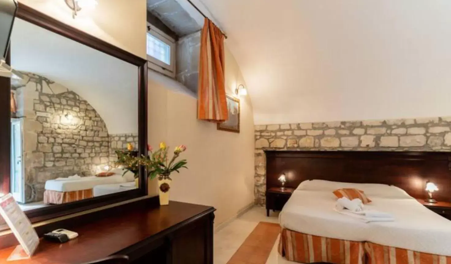 Bed in Palazzo Il Cavaliere B&B De Charme