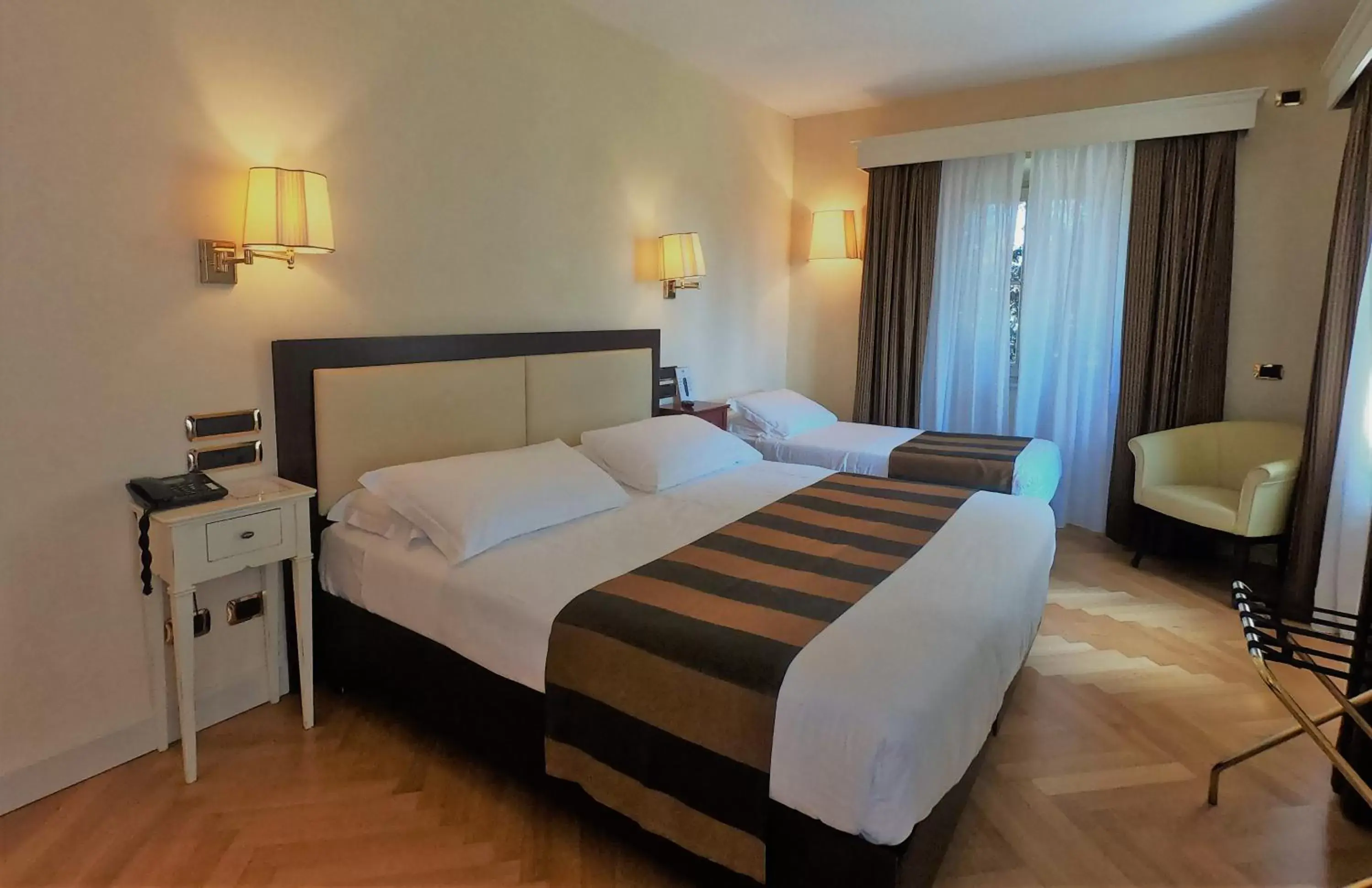 Photo of the whole room, Bed in Parco Termale di Villa Dei Cedri