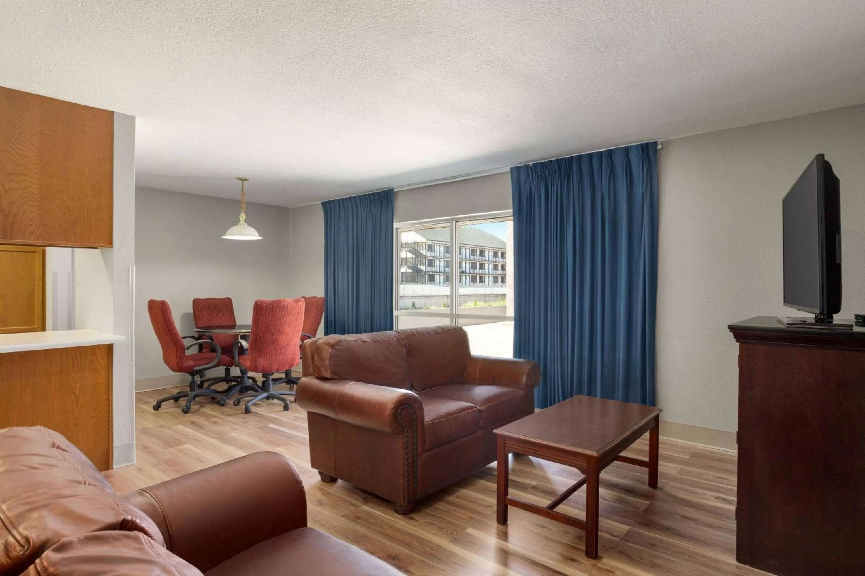 TV and multimedia in AmericInn by Wyndham Branson & Conference Center