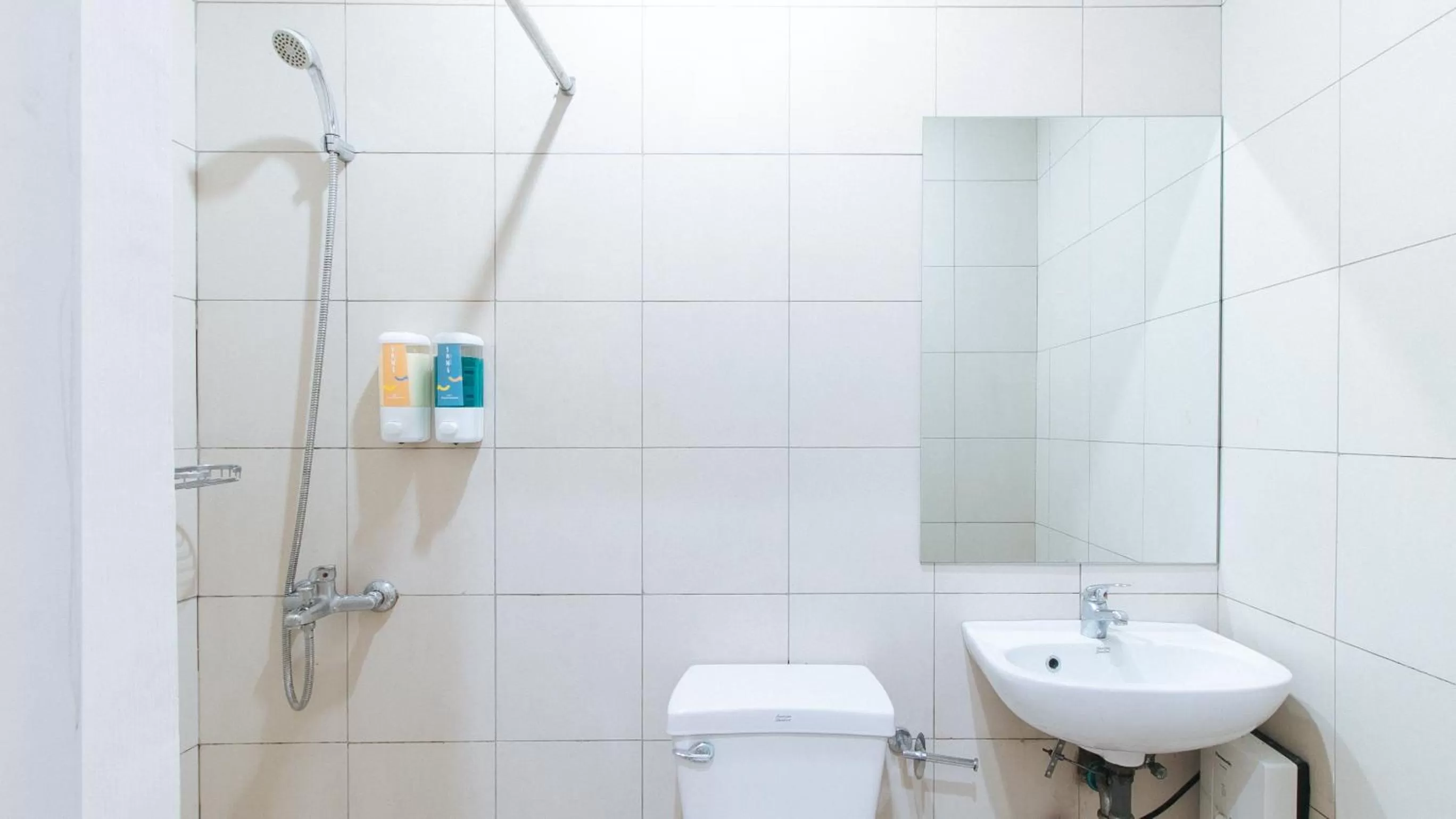Shower in Sans Hotel Laperal Manila