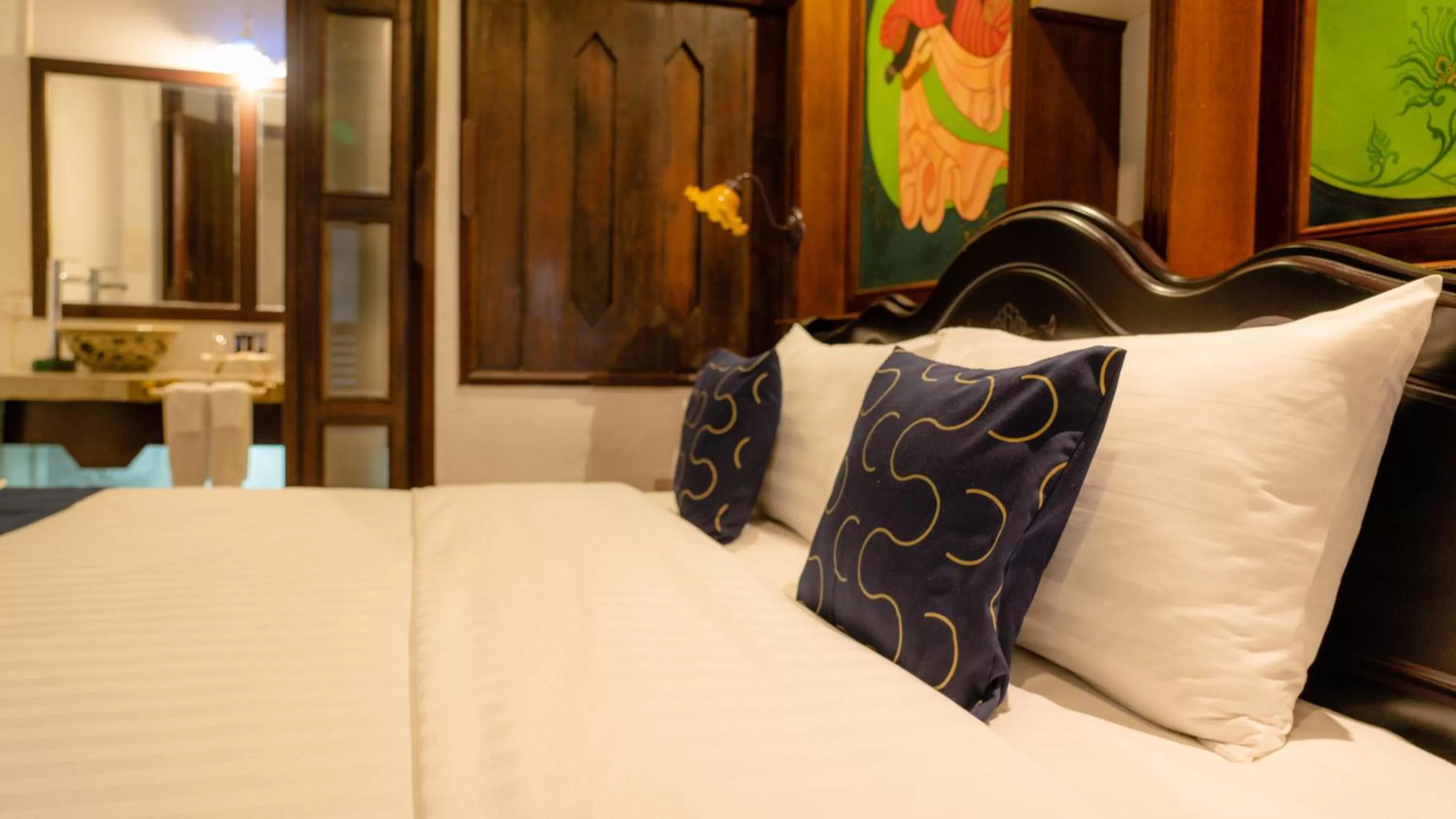 Bed in Cheva Gallery Boutique Hotel
