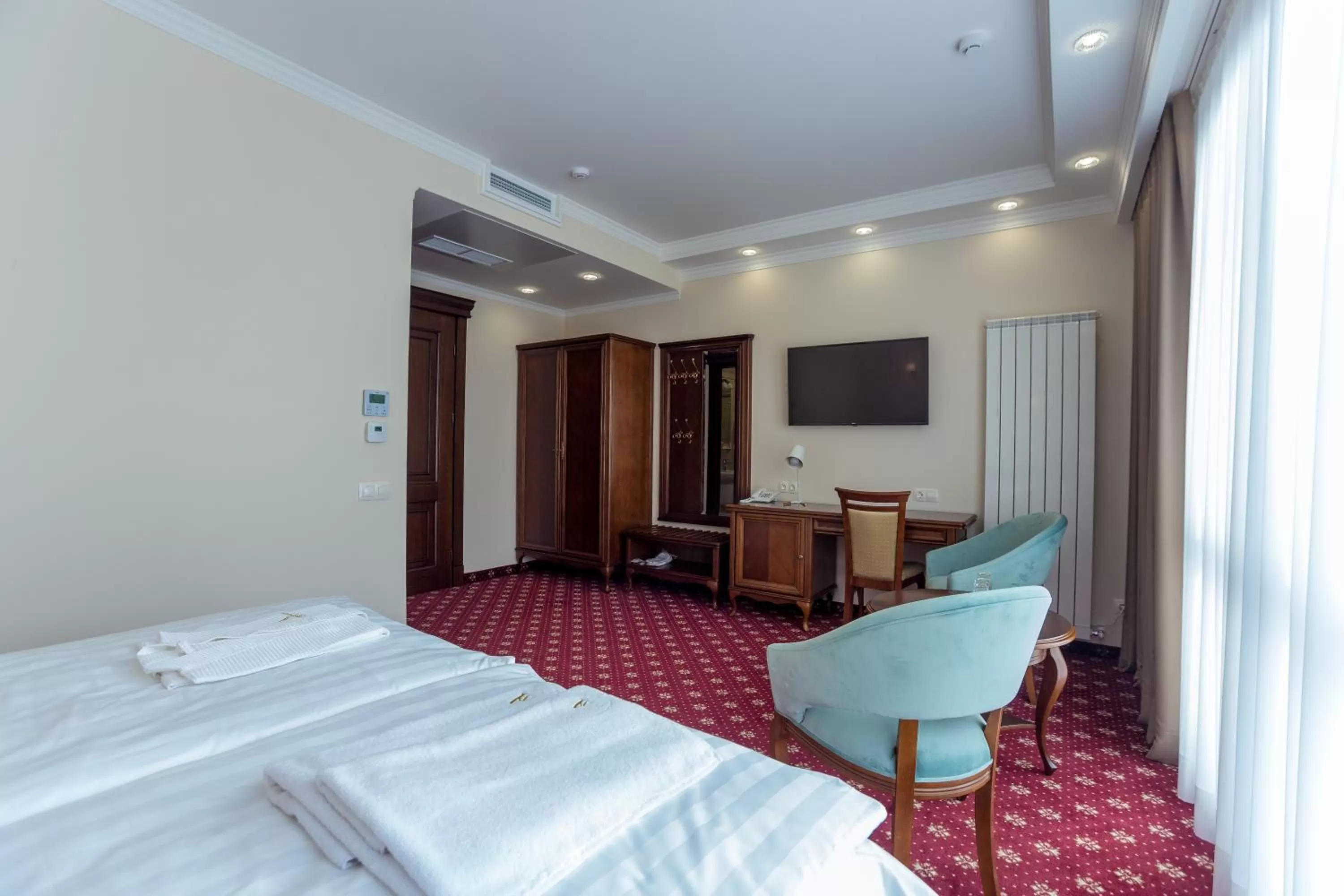 Photo of the whole room, Bed in Ambassador Hotel