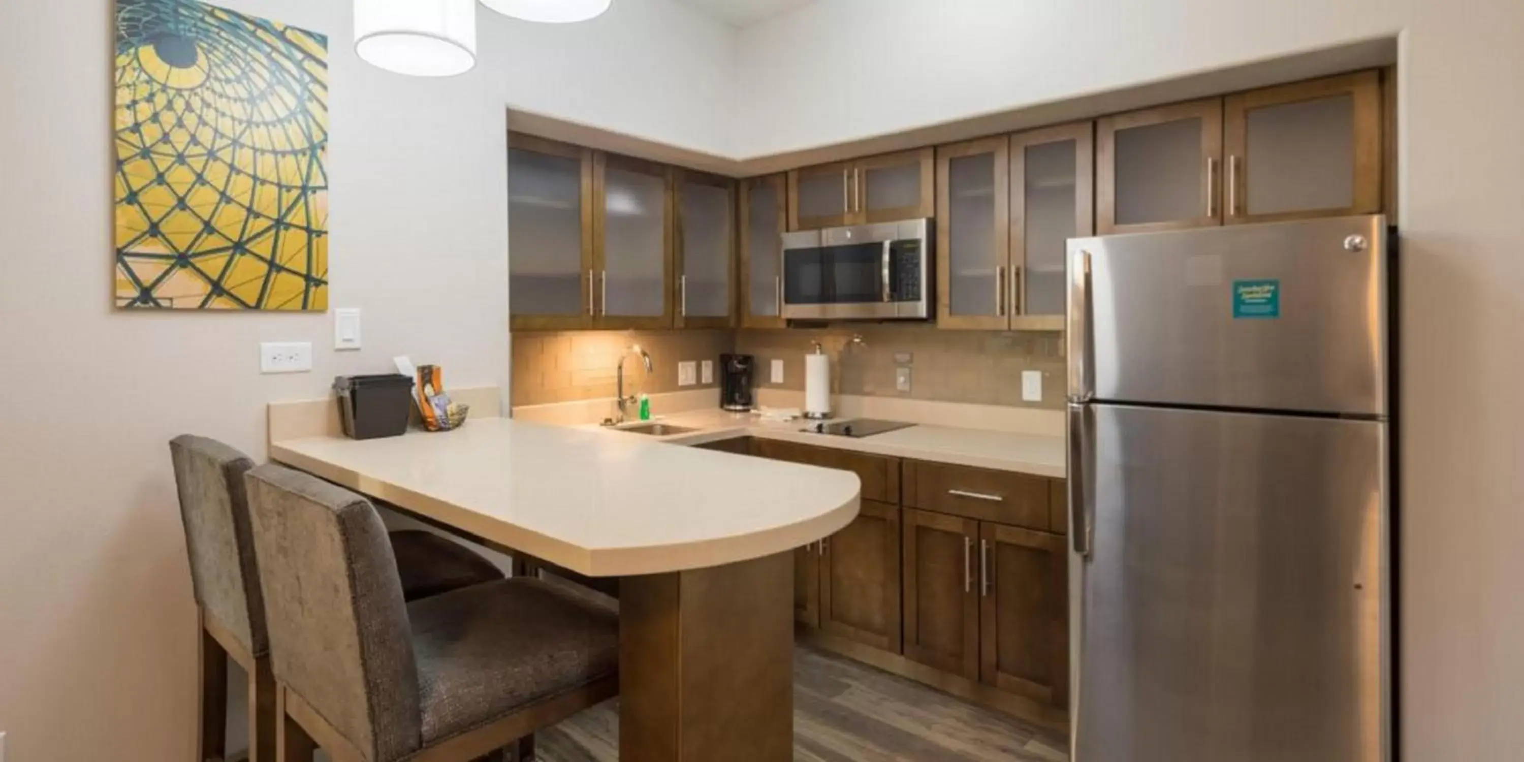 Photo of the whole room, Kitchen/Kitchenette in Staybridge Suites Houston East - Baytown, an IHG Hotel