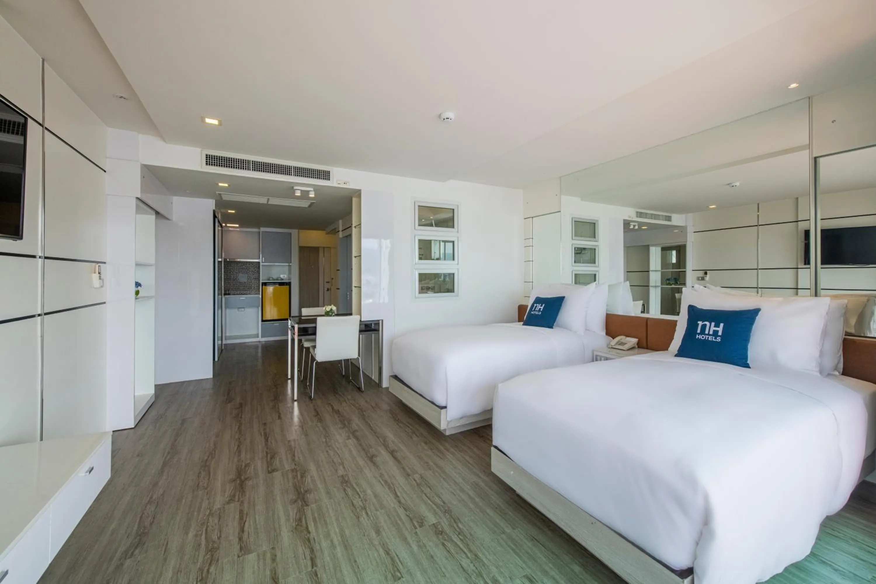 Bed in NH Boat Lagoon Phuket Resort