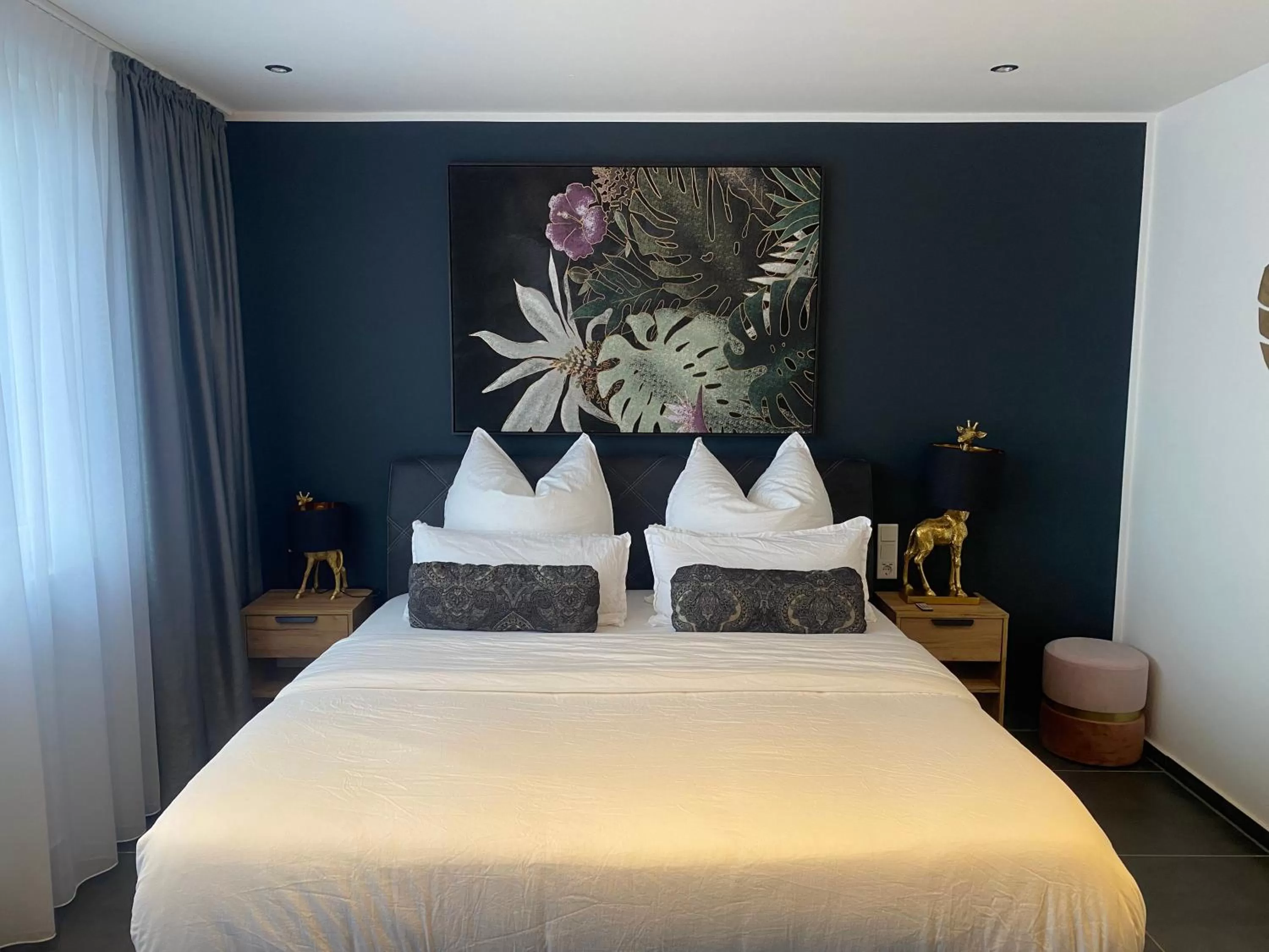 Bed in MARRAM Suitehotel