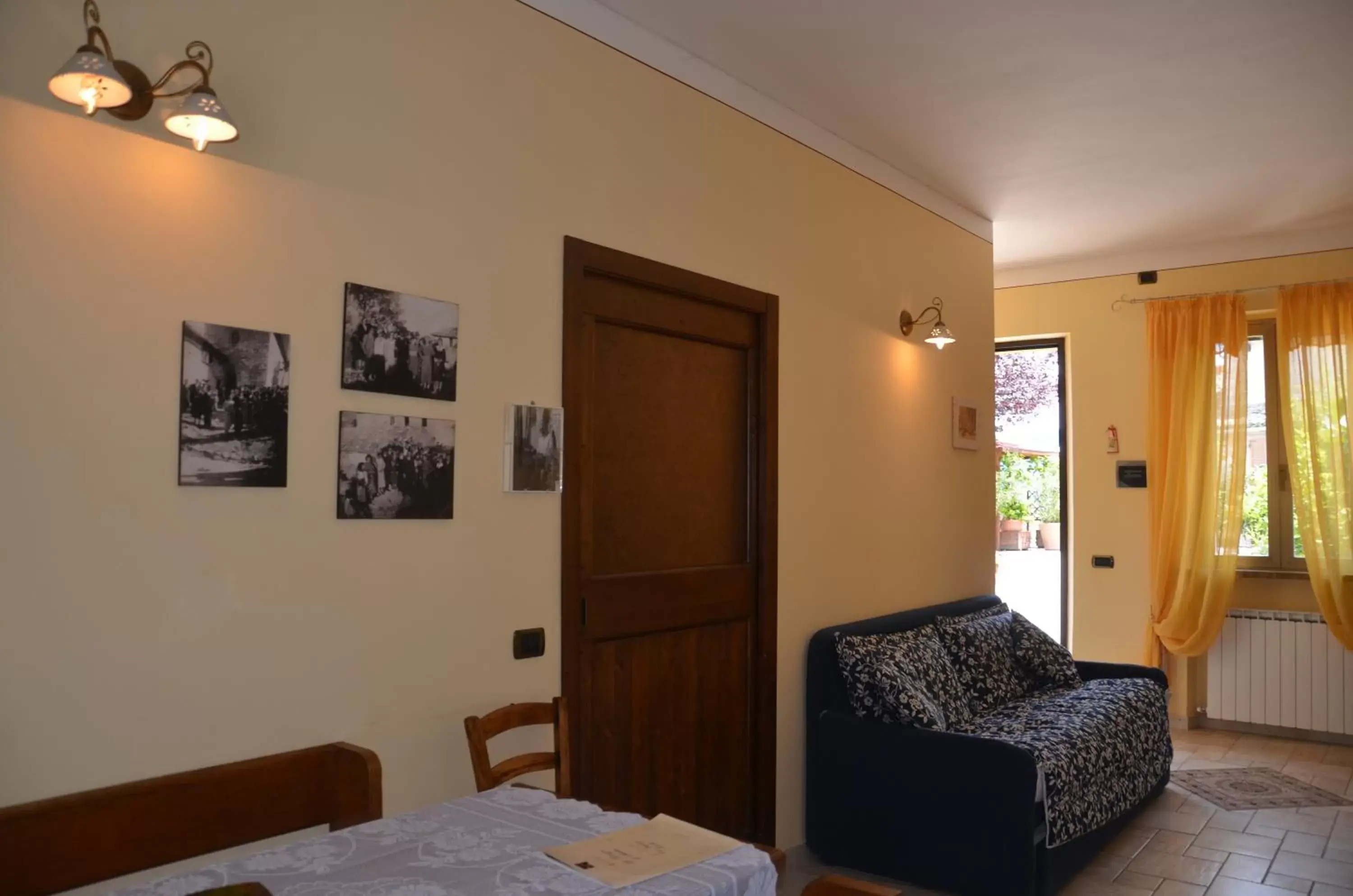 Communal lounge/ TV room, Seating Area in B&B La Terrazza Del Subasio