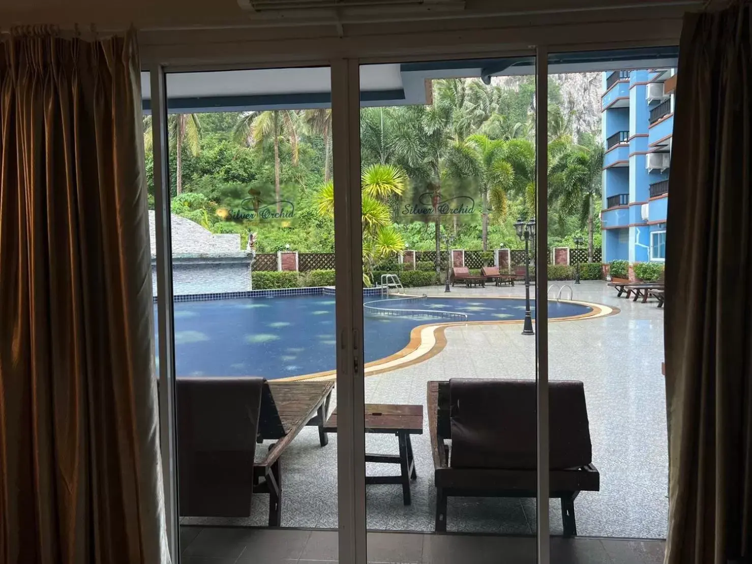 Balcony/Terrace, Pool View in Aonang Silver Orchid Resort