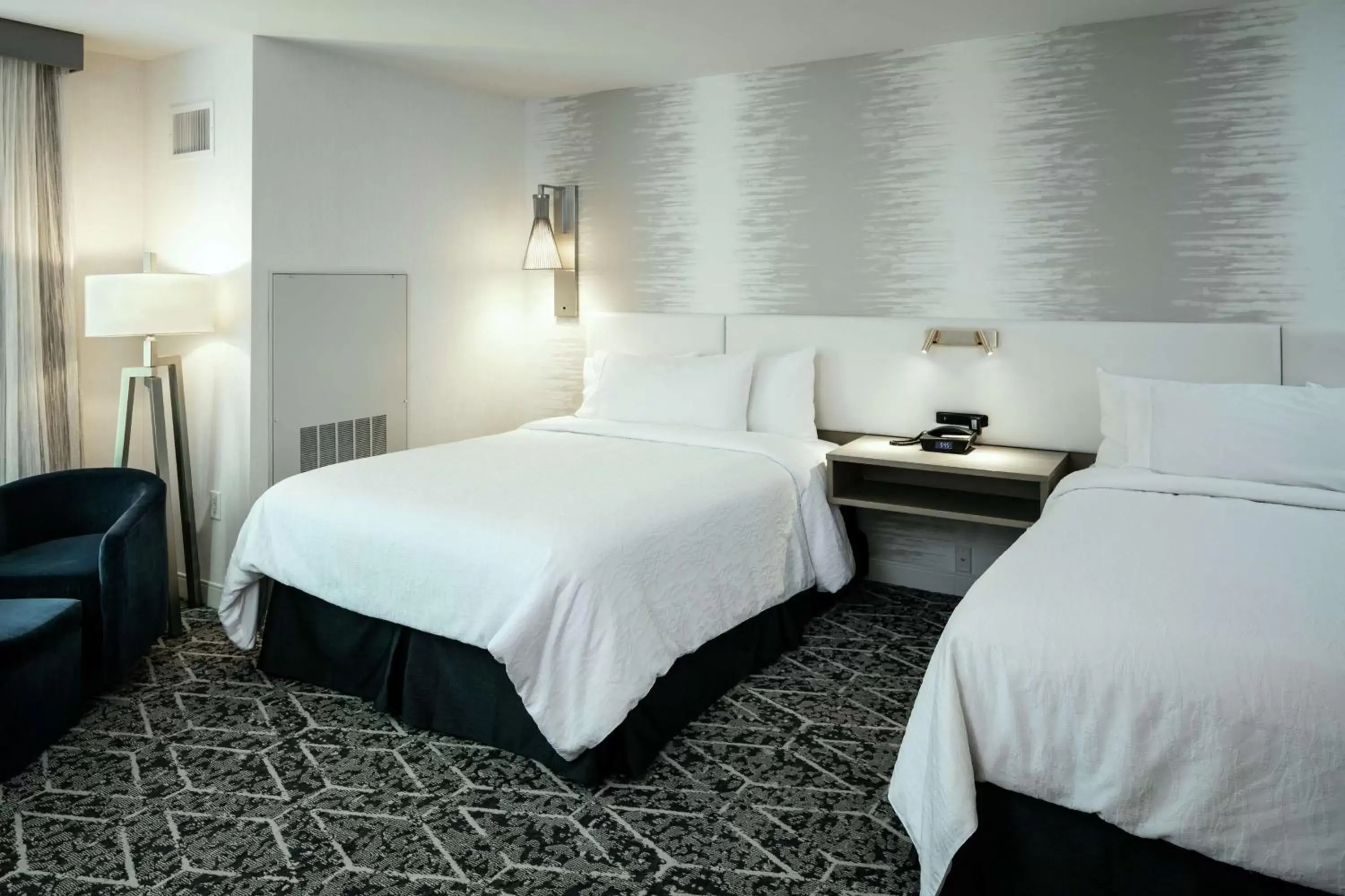 Living room, Bed in Hilton Garden Inn Seattle Bellevue Downtown, WA Living room, Bed in Hilton Garden Inn Seattle Bellevue Downtown, WA