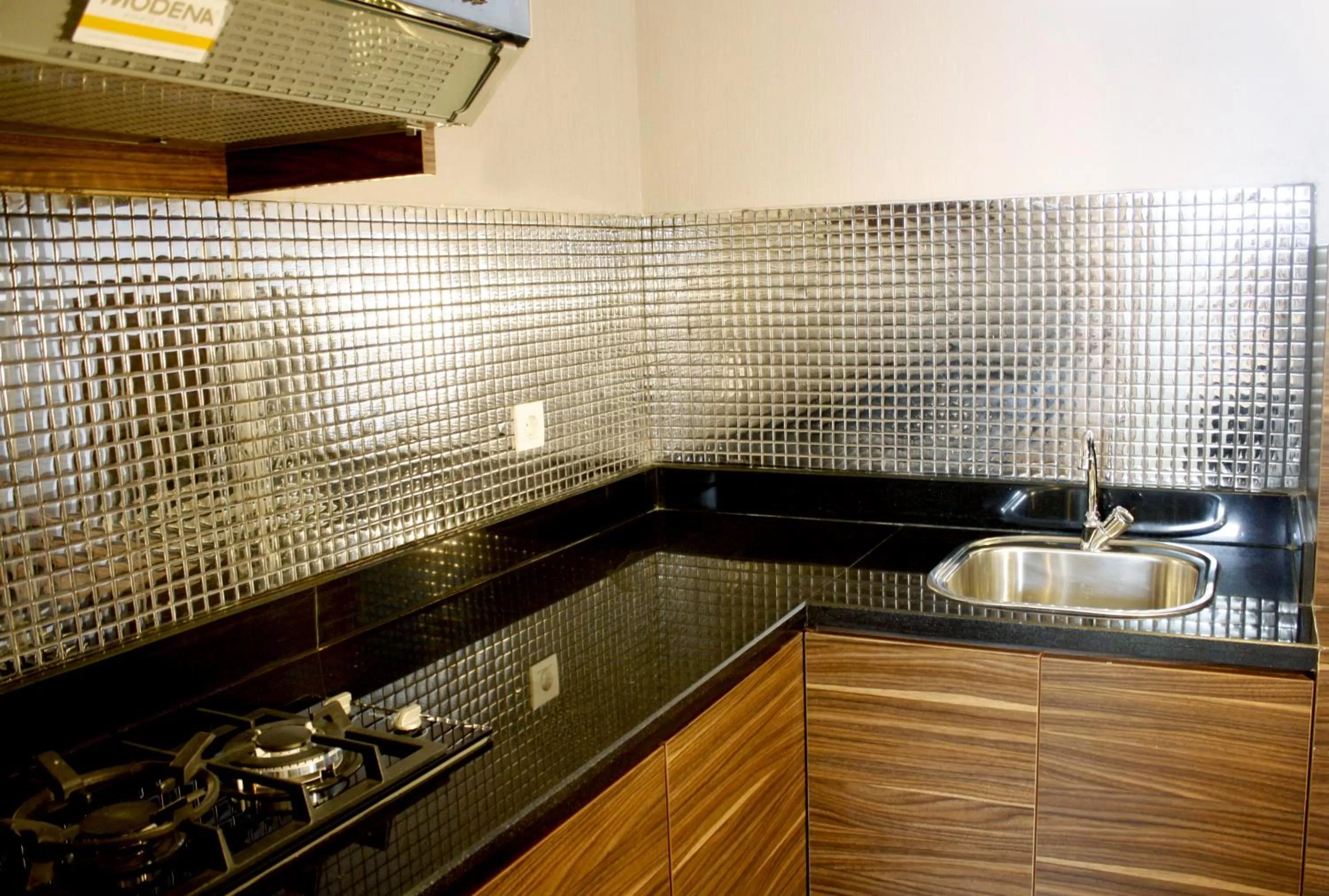 Kitchen or kitchenette in Pranaya Boutique Hotel