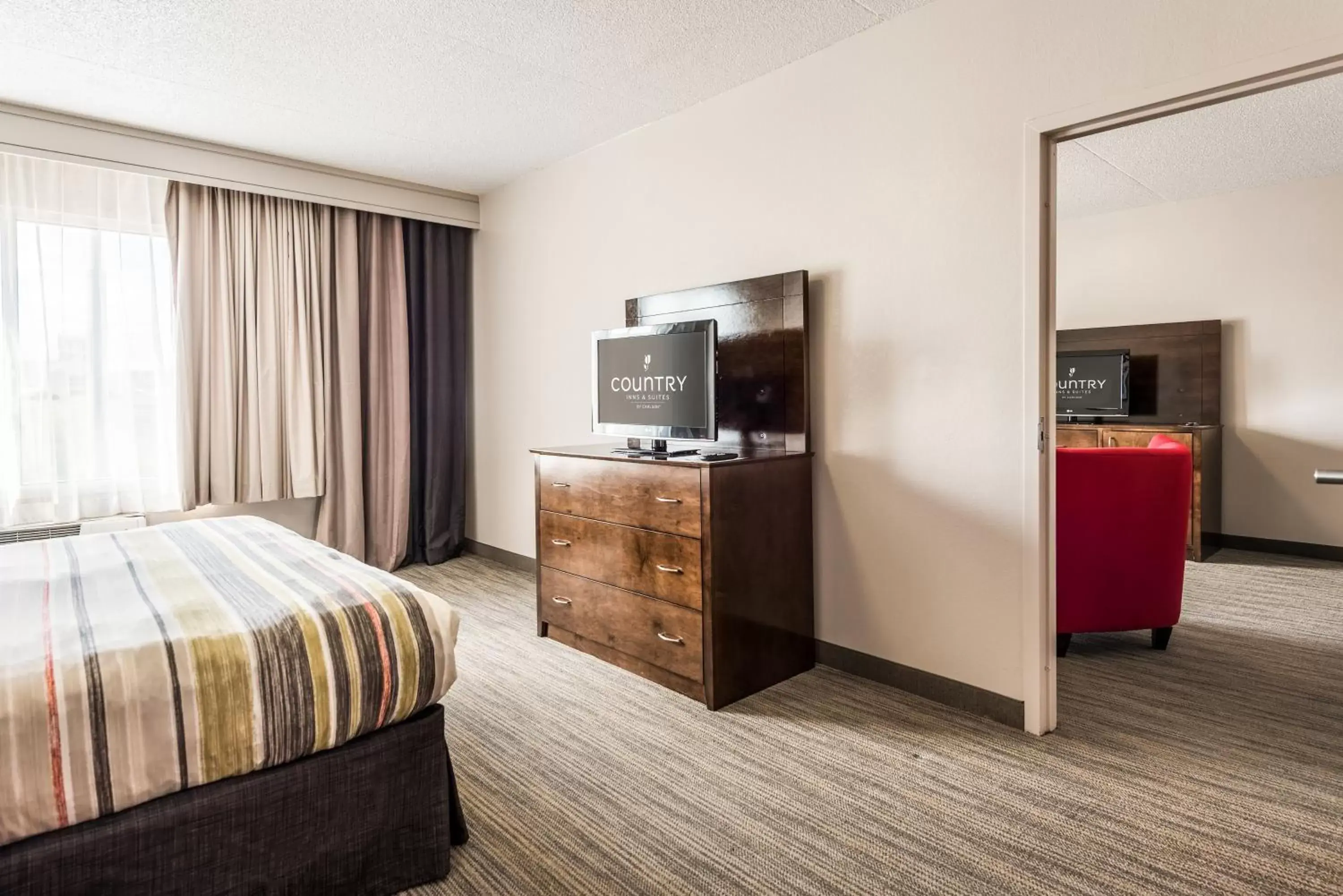 Photo of the whole room, TV/Entertainment Center in Country Inn & Suites by Radisson, Cookeville, TN