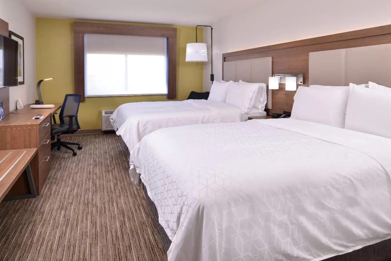 Bed in Holiday Inn Express Hotel and Suites Mesquite, an IHG Hotel