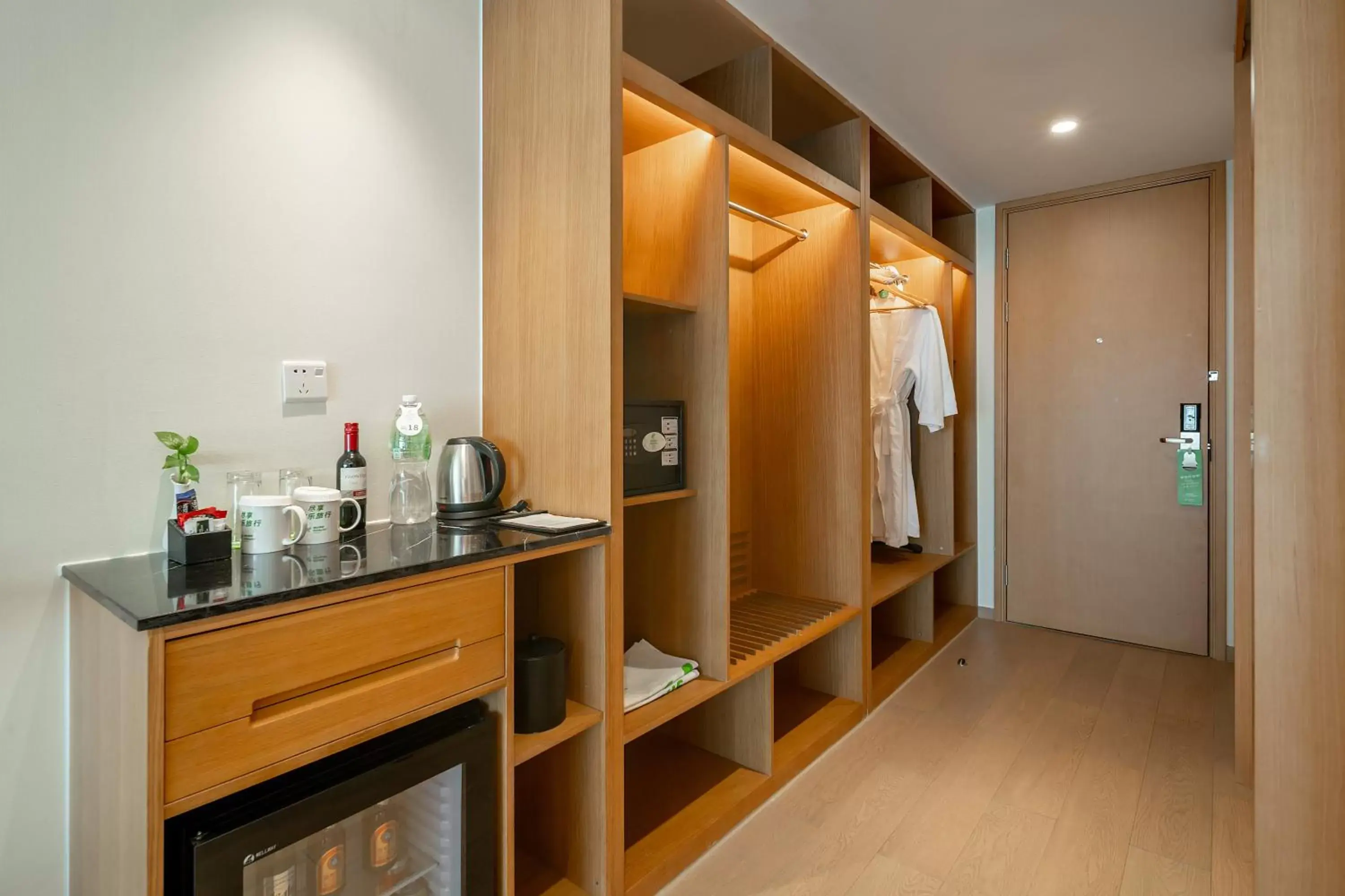 wardrobe in Holiday Inn Shanghai Hongqiao Central, an IHG Hotel