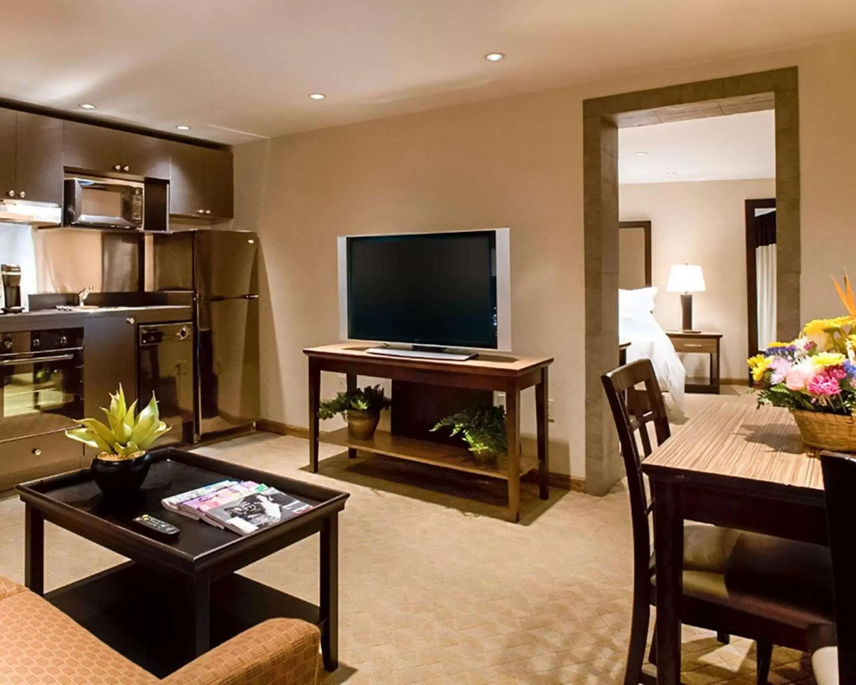Photo of the whole room, TV/Entertainment Center in The Woodlands Inn