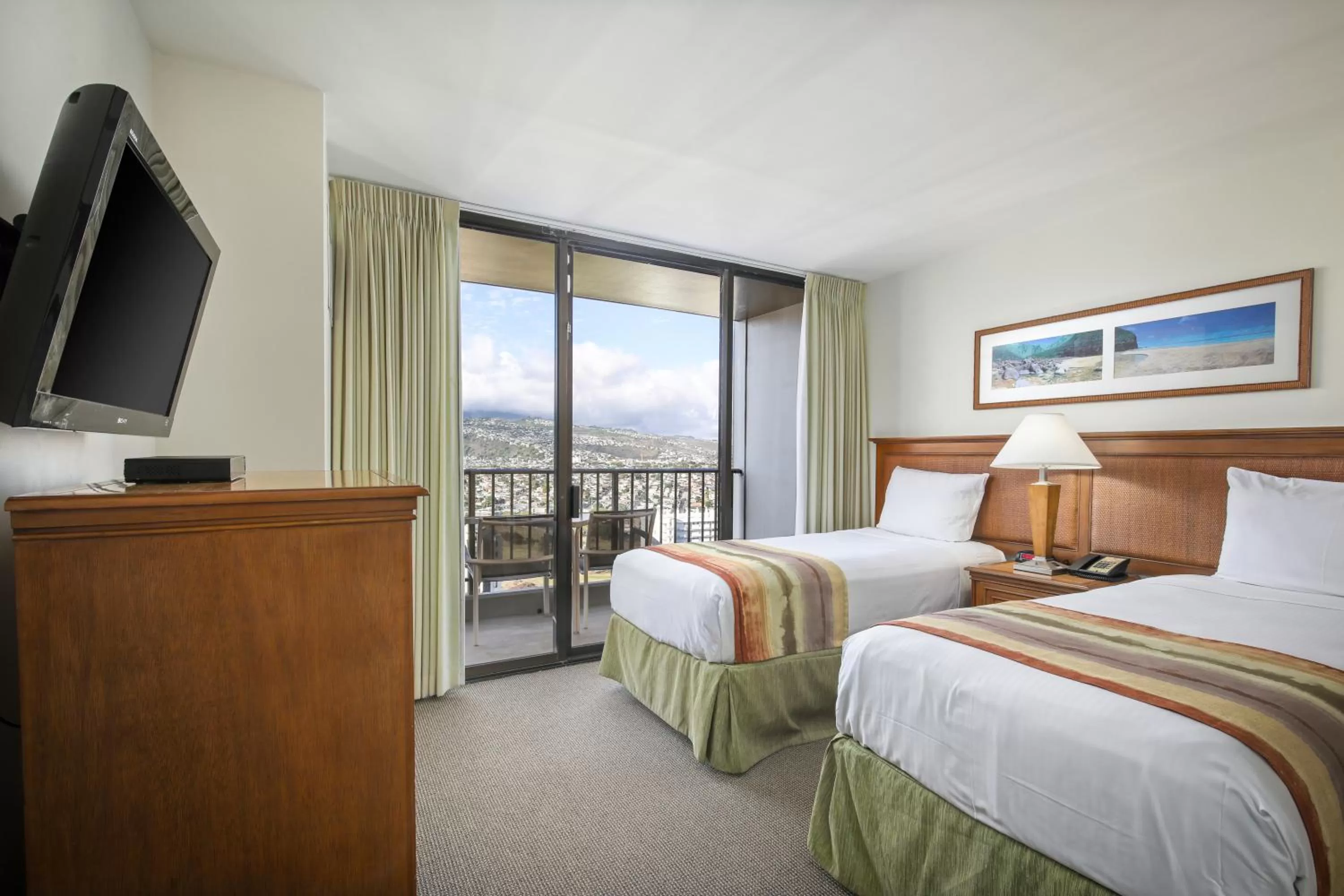 Bed in Aston Waikiki Sunset