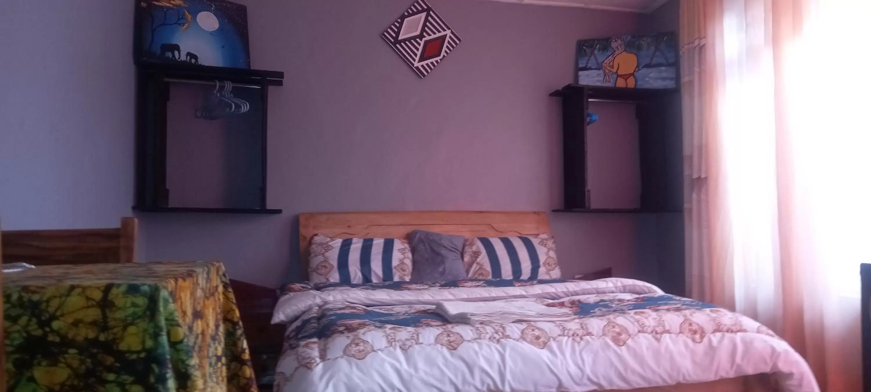 Bed in Tommy's Budget Rooms