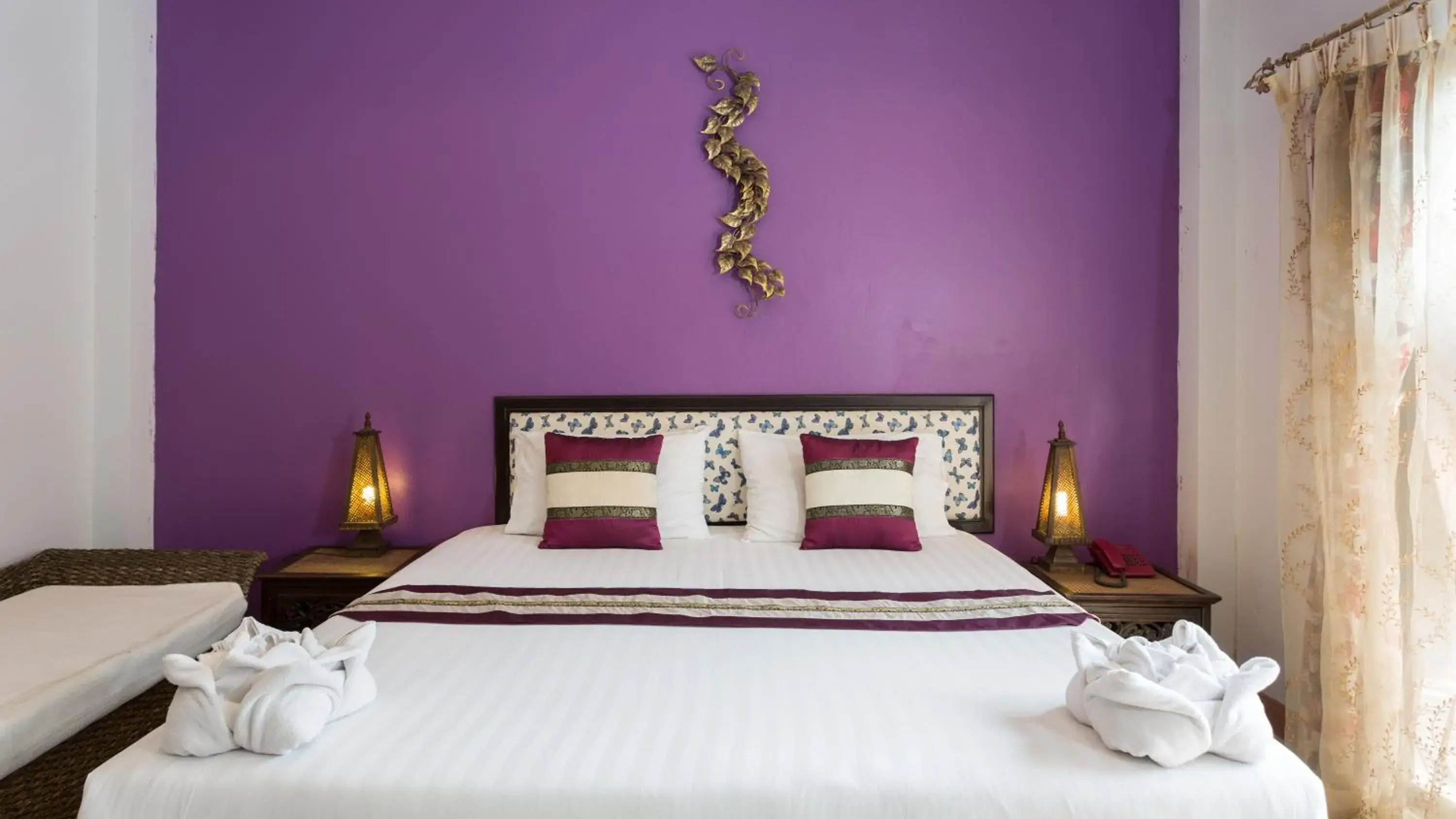 Bed in Ploy Khumthong Boutique Resort