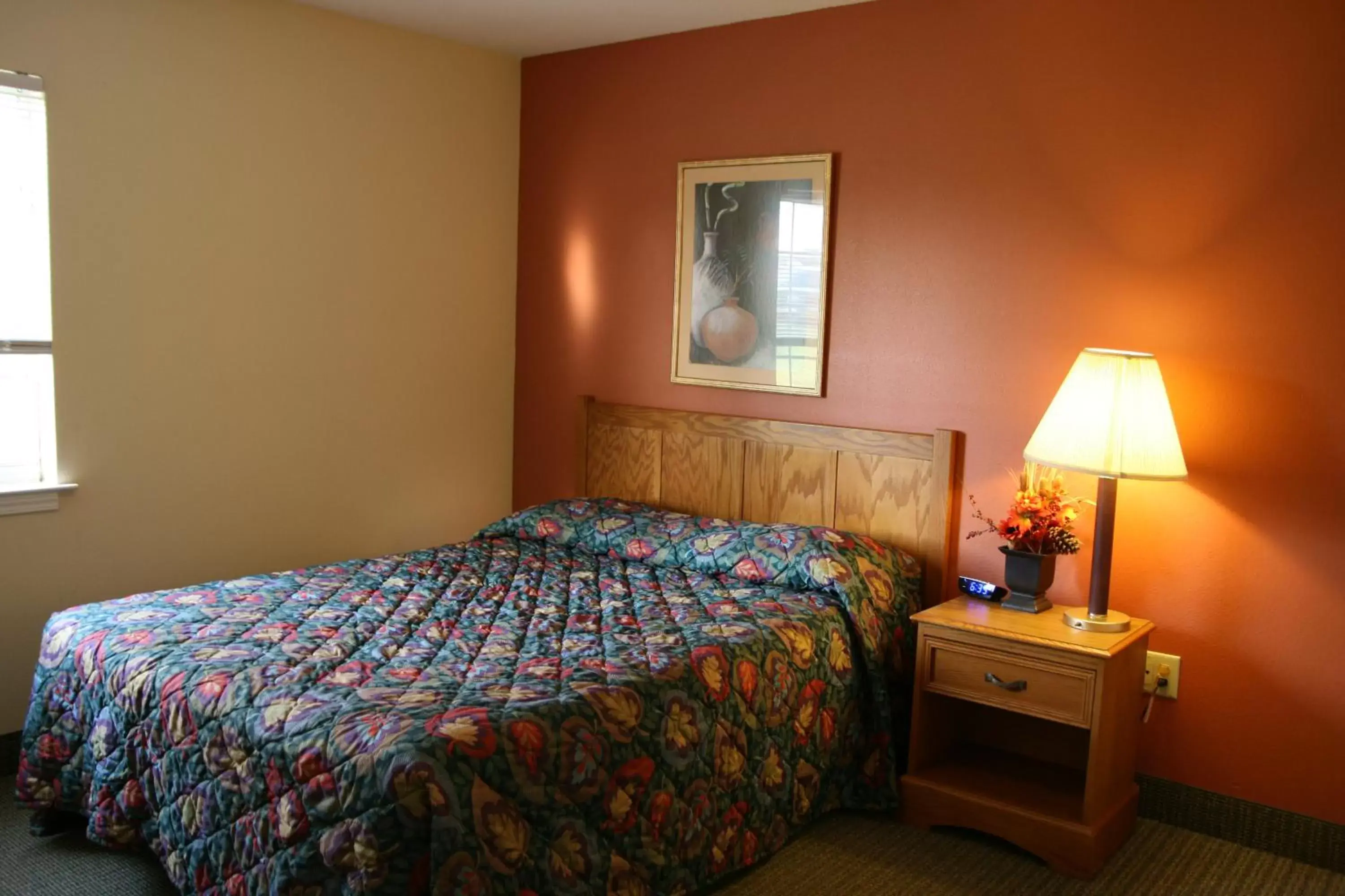 Bed in Affordable Suites Rocky Mount