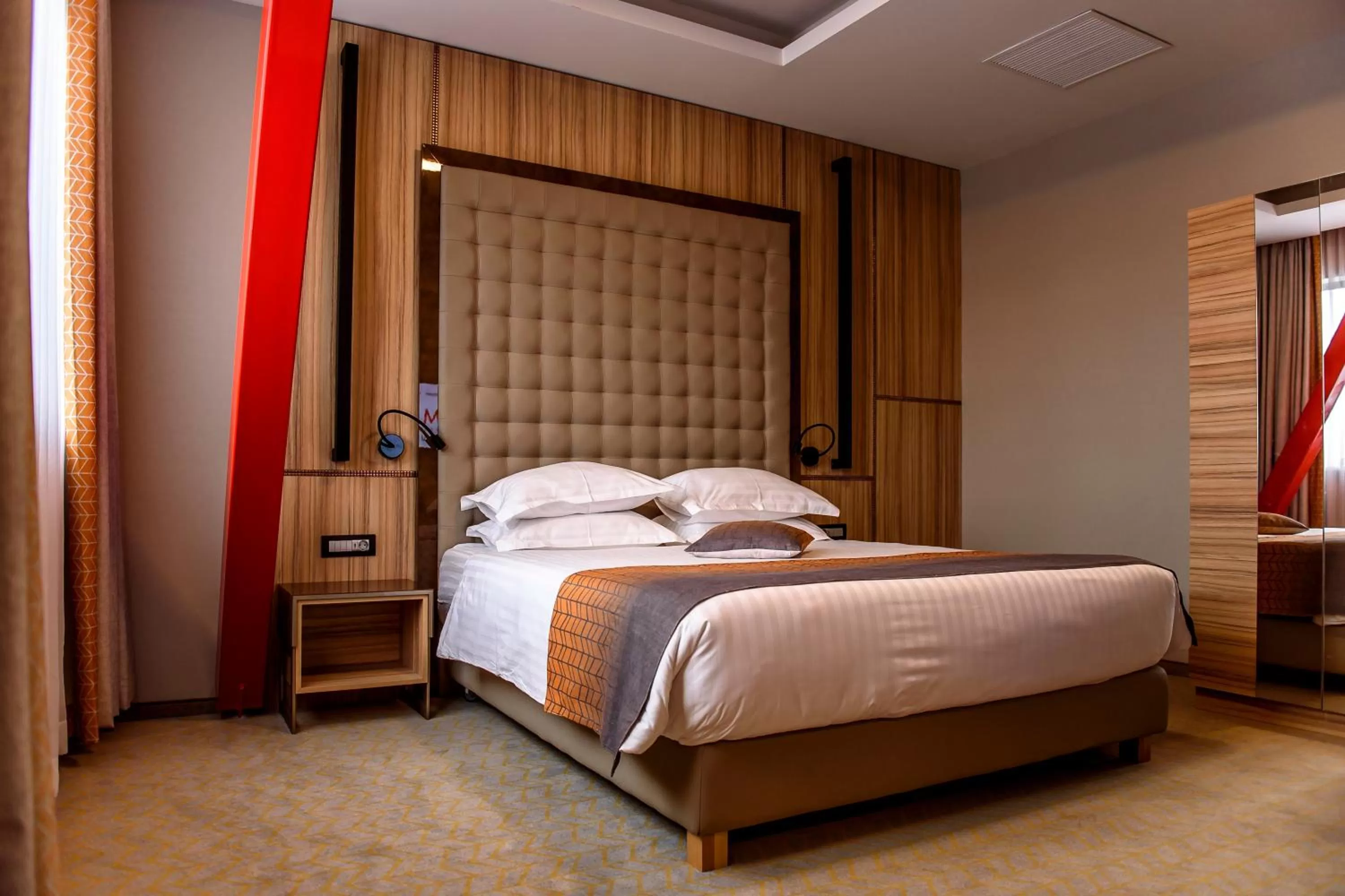 Bed in Ramada by Wyndham Ramnicu Valcea