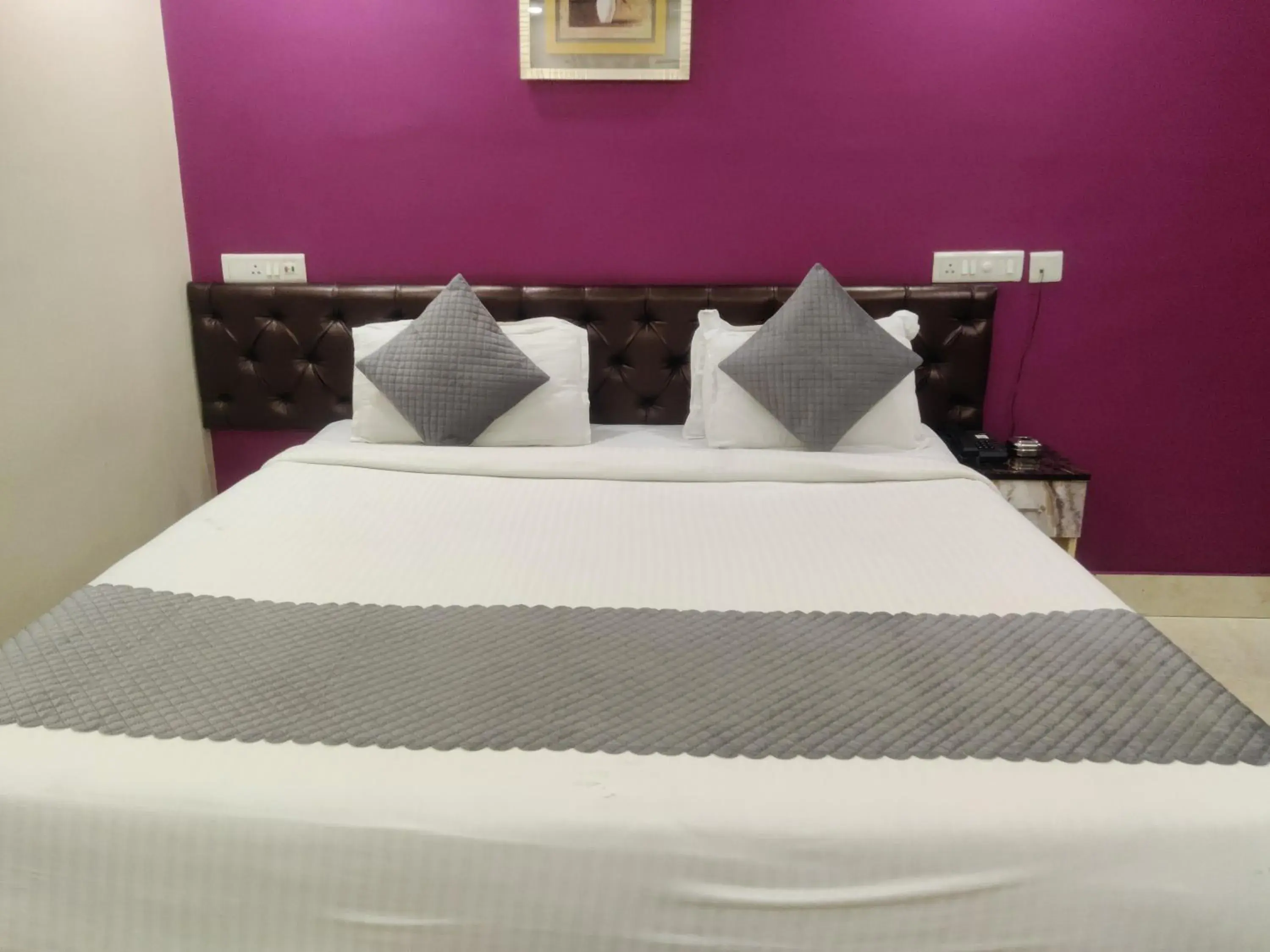 Bed in Hotel Swastik Regency