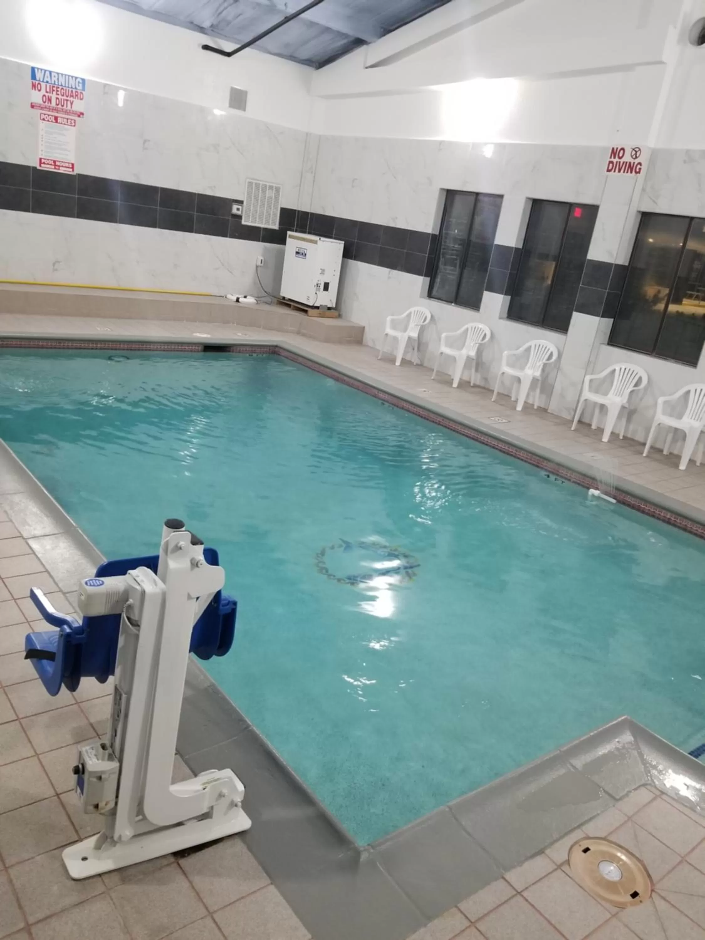 Swimming pool in Days Inn & Suites by Wyndham Webster NASA-ClearLake-Houston