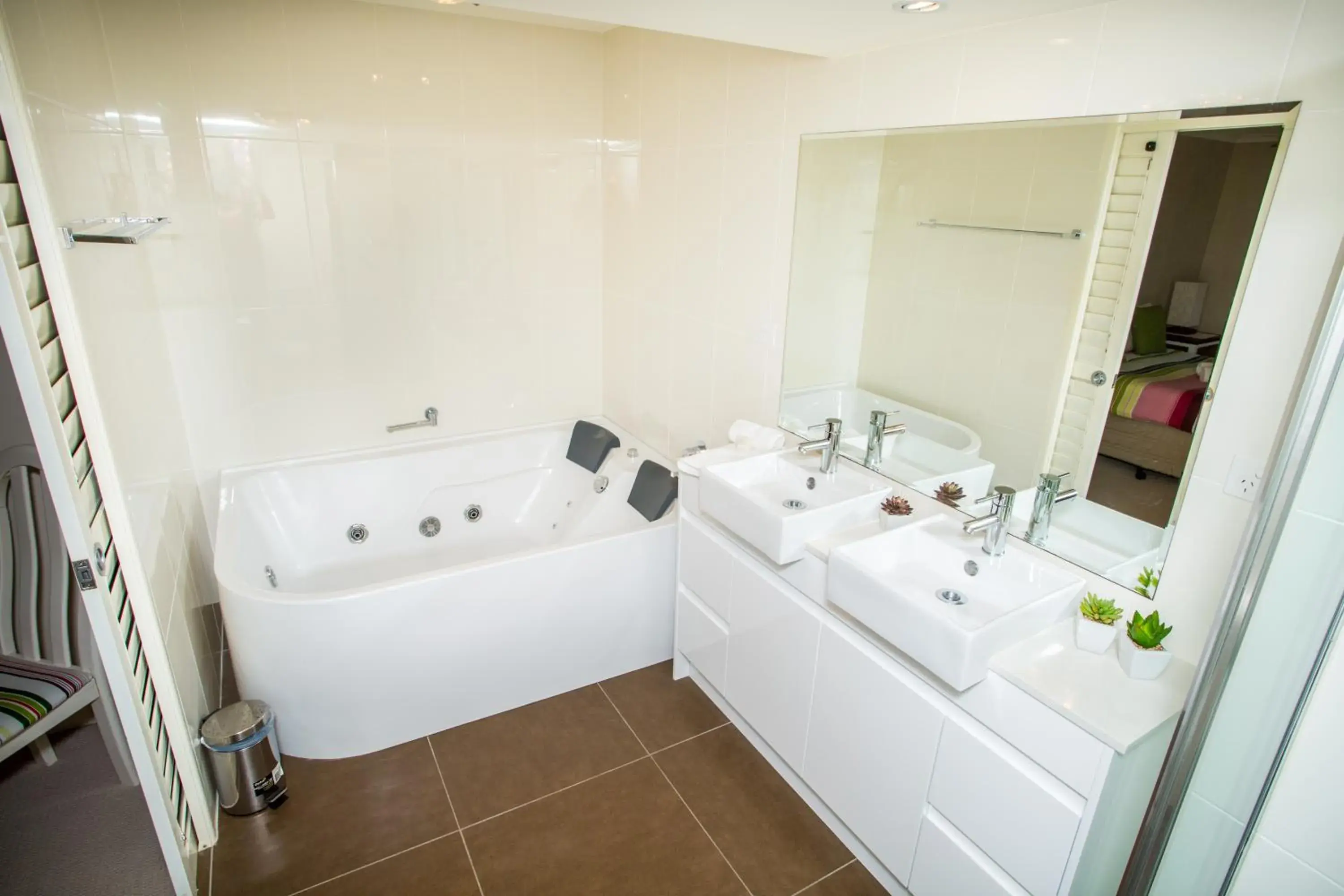 Balcony/Terrace, Bathroom in Sanctuary Beach Resort