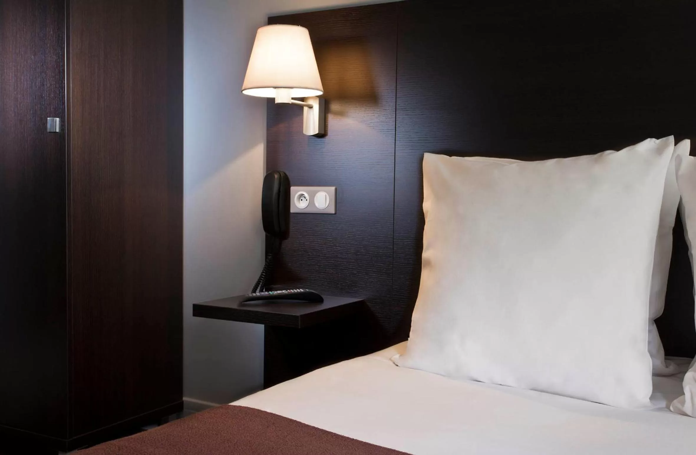 Bed in Hôtel des Ecrivains