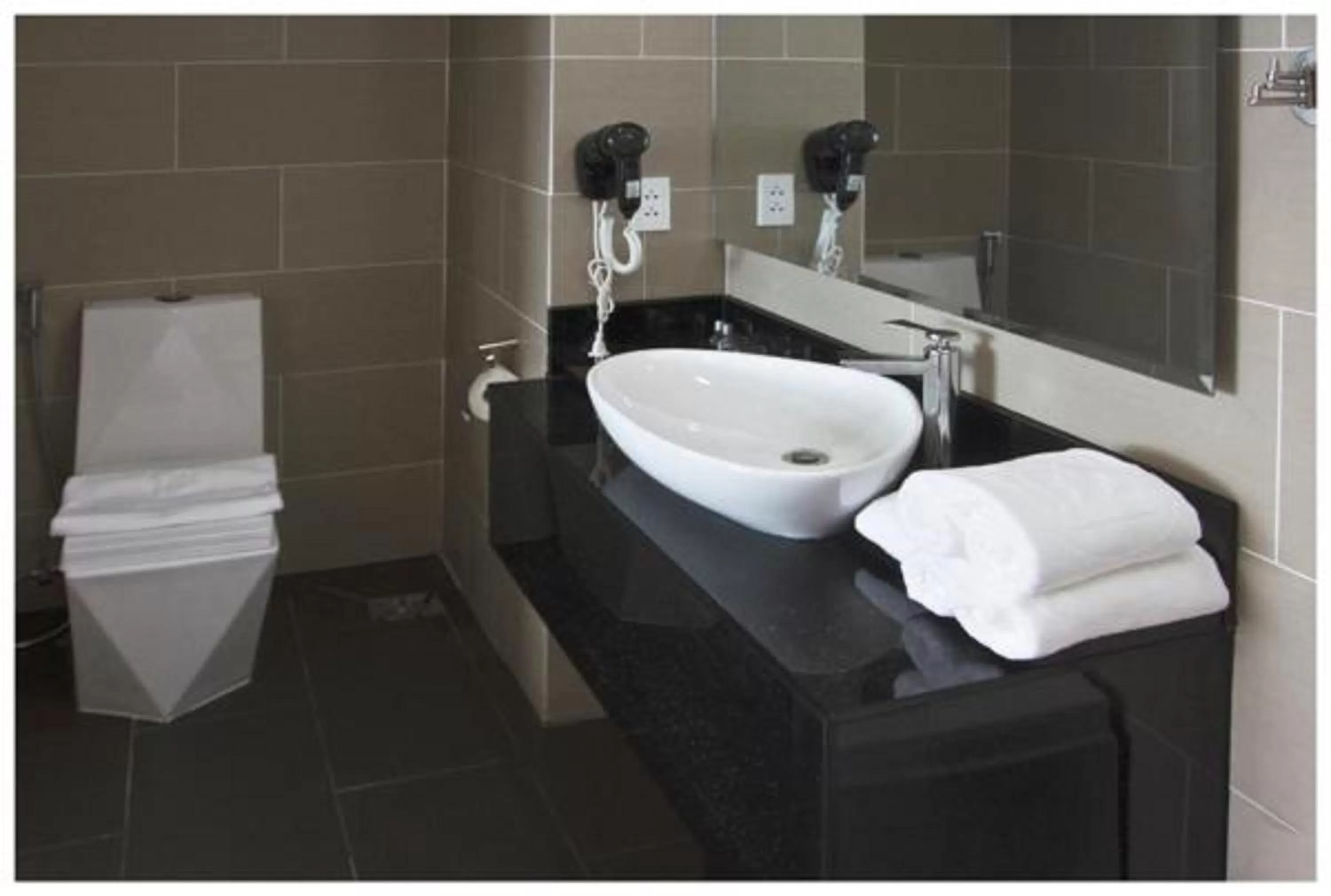 Bathroom in New Sun Hotel