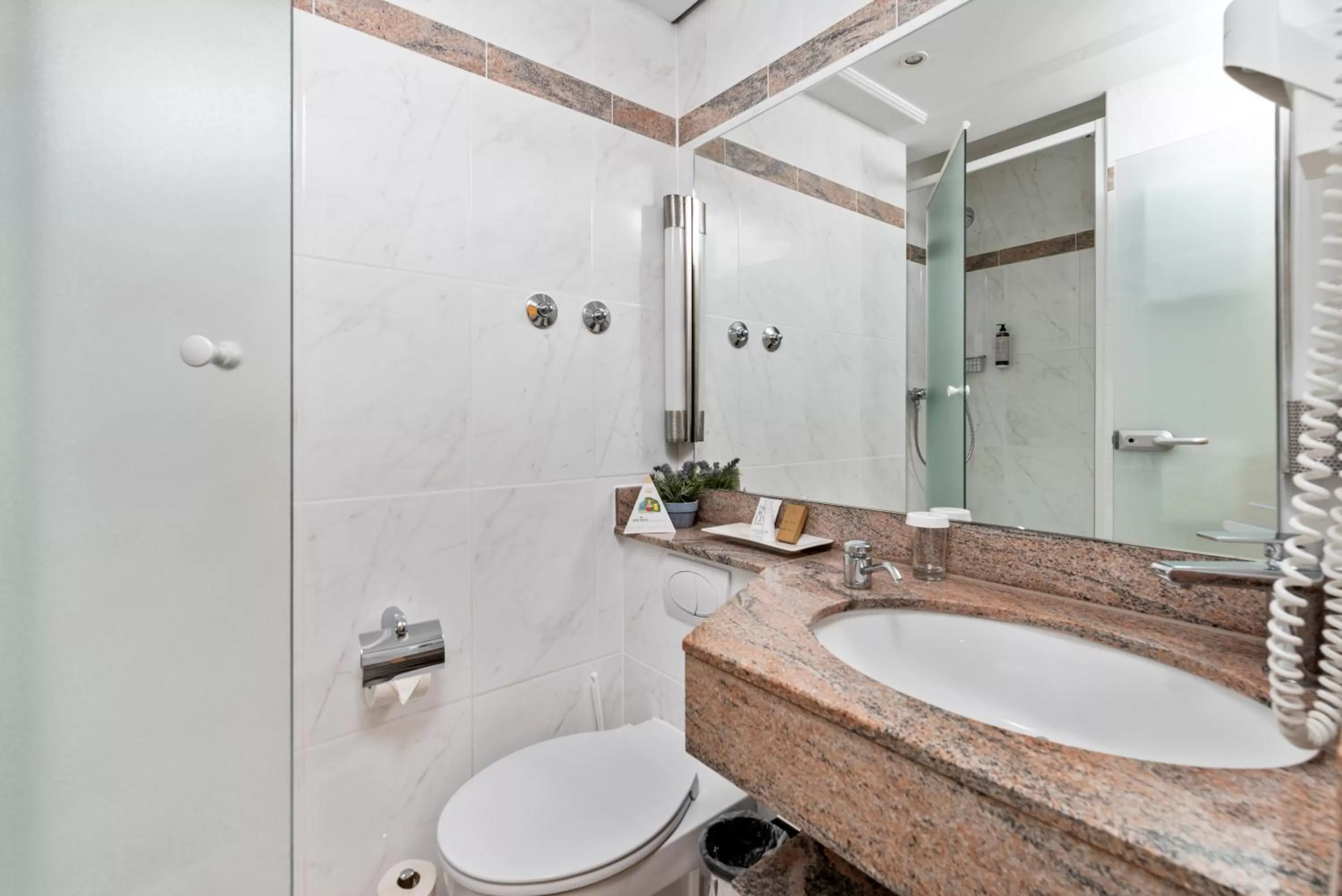 Bathroom in KING's Hotel First