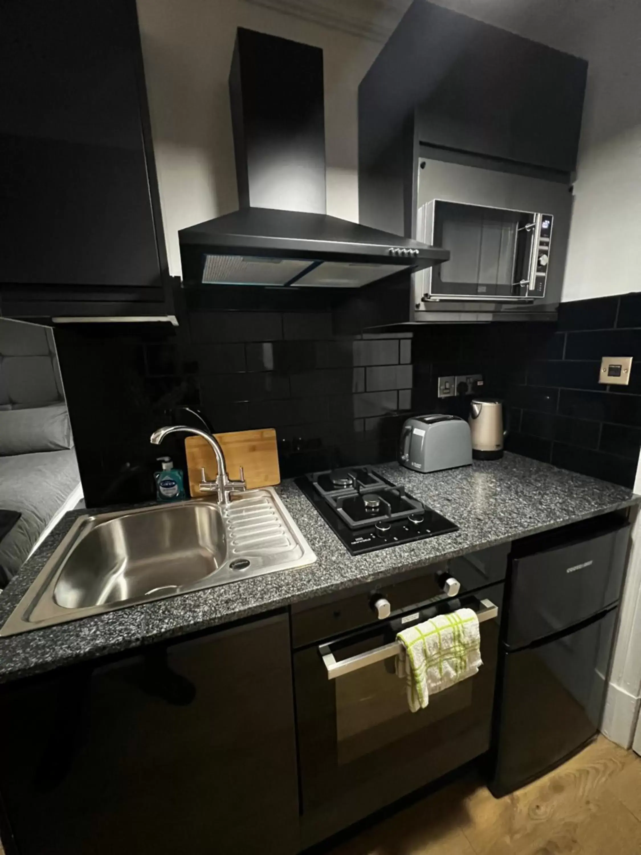 Kitchen or kitchenette, Kitchen/Kitchenette in Amani Apartments - Glasgow City Centre
