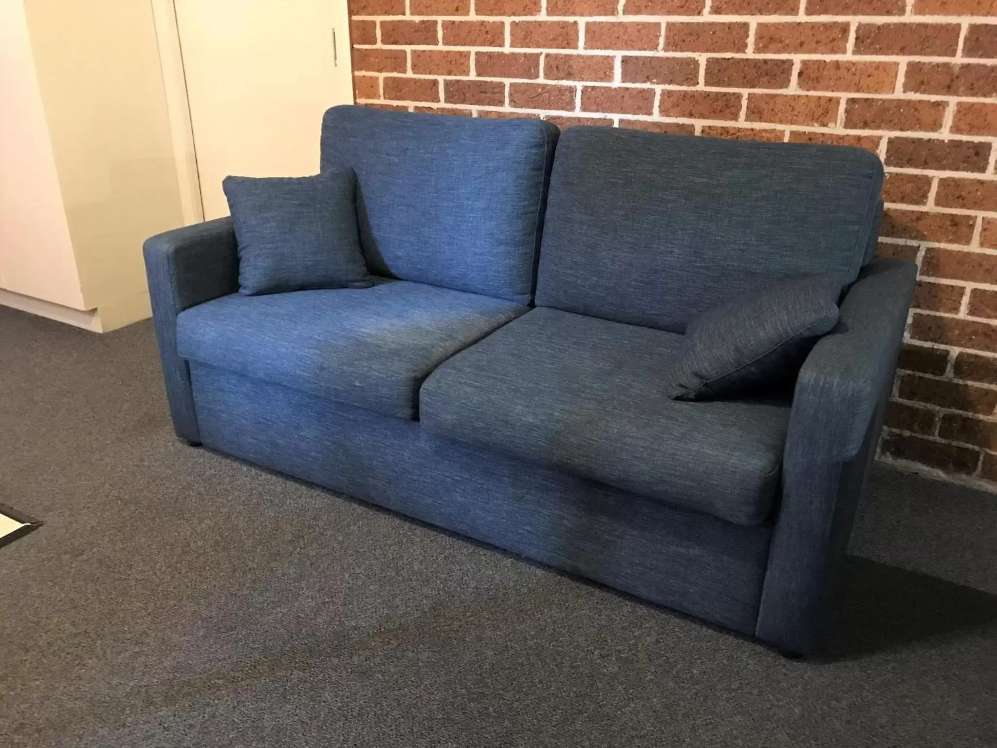 Bed, Seating Area in Coffs Shearwater Motel