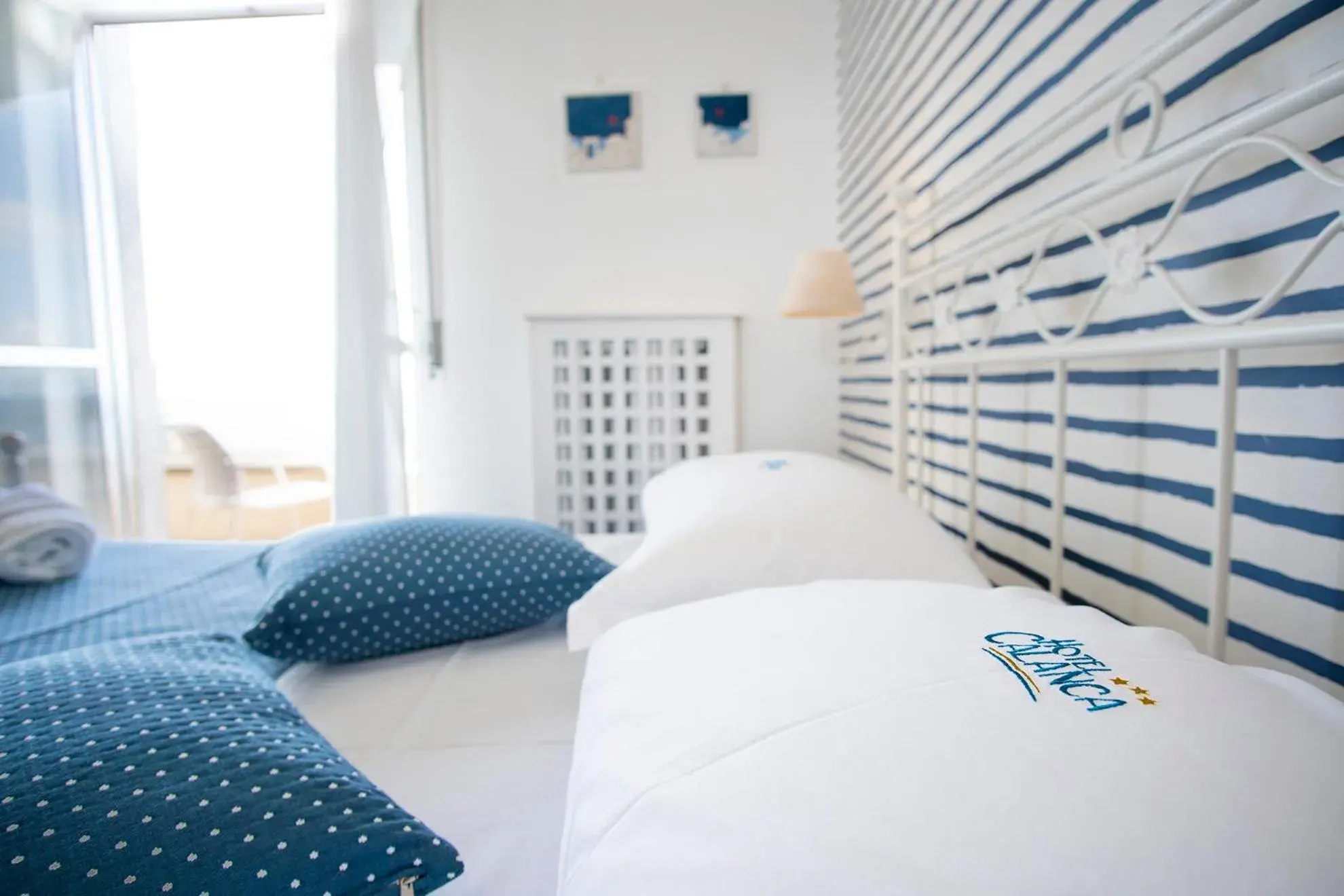 Bed in Hotel Calanca