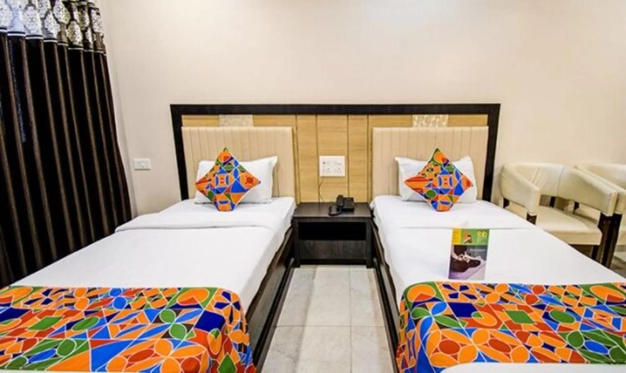 Bed in FabHotel Krishna Regency