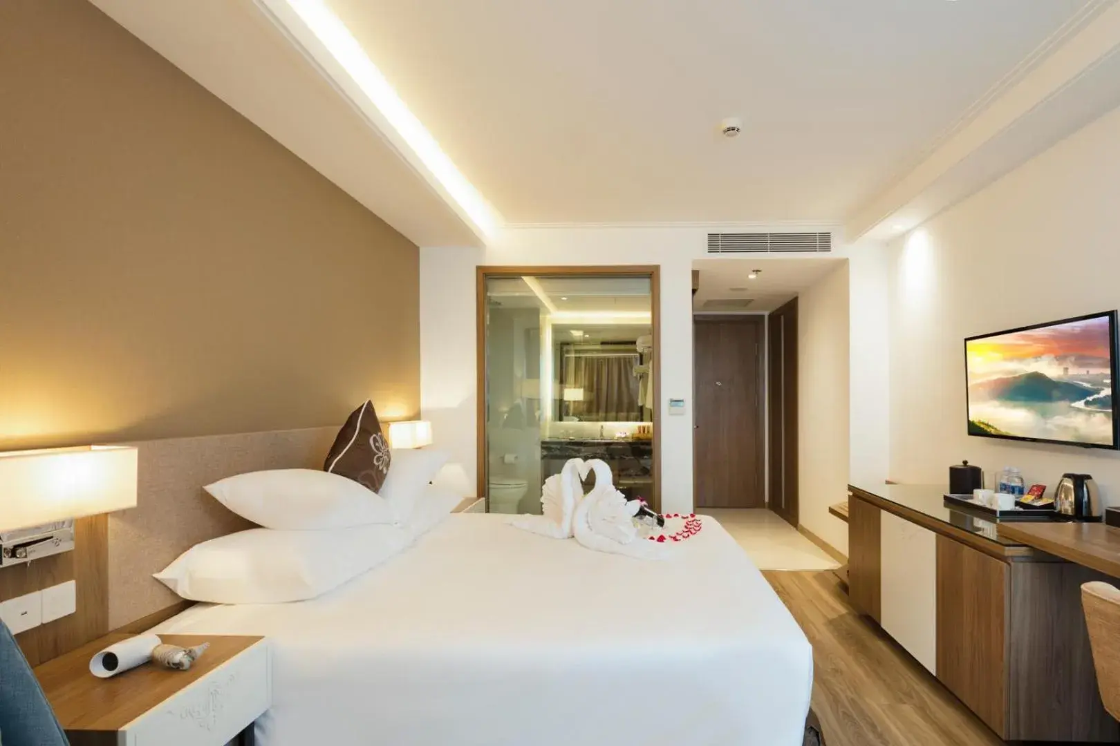 Photo of the whole room, Bed in Asteria Comodo Nha Trang Hotel