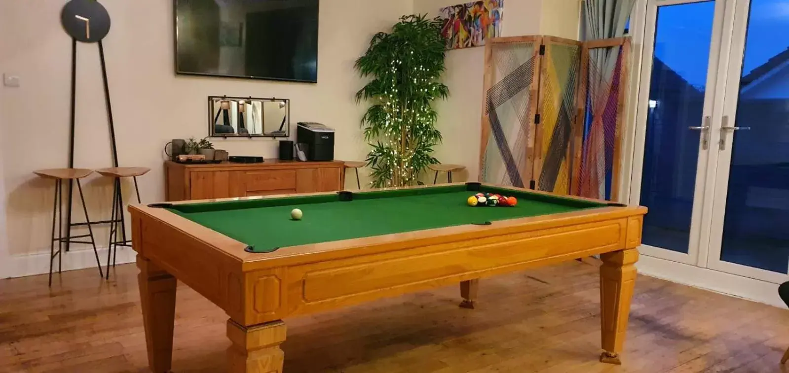 Billiards in The Orange Fox Lux Room and Hot Tub at The Grumpy Schnauzer Guest House
